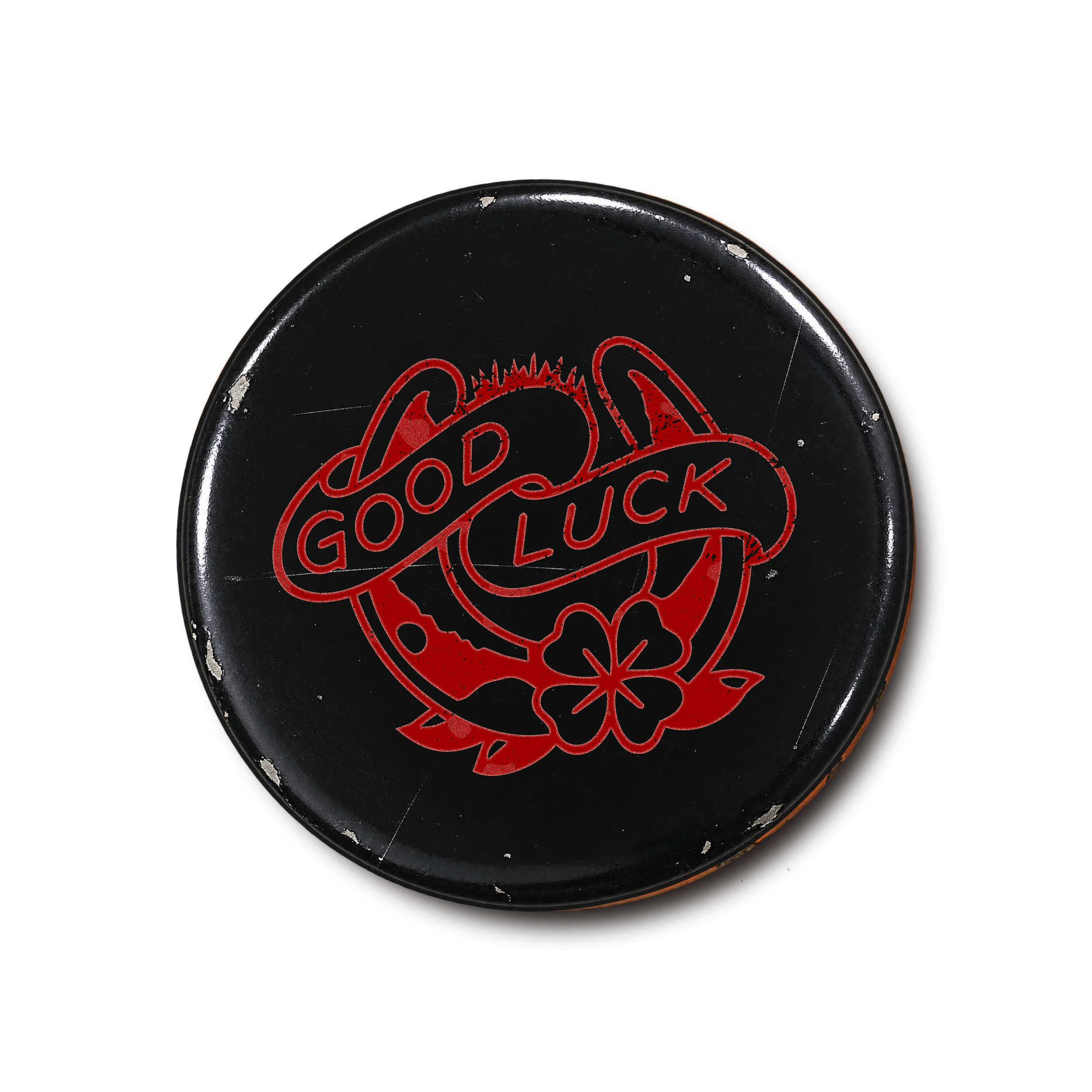 Close-up of a black rock with a red logo reading 'Bad Guy Coffee' on its surface