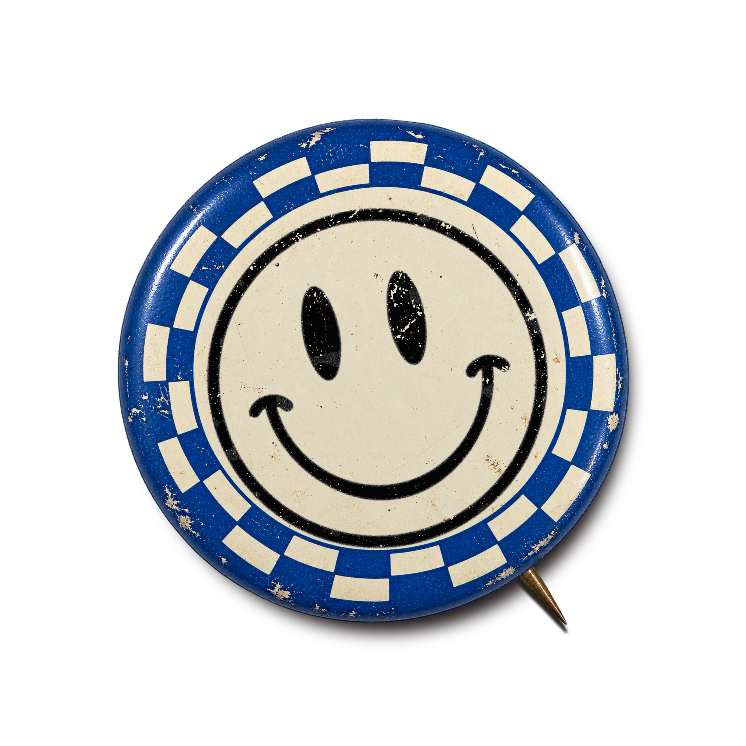 Vintage round Pinocchio ice cream or candy decoration with a blue and white checkered border and a smiling face in the center, with some wear and chipping on the surface.