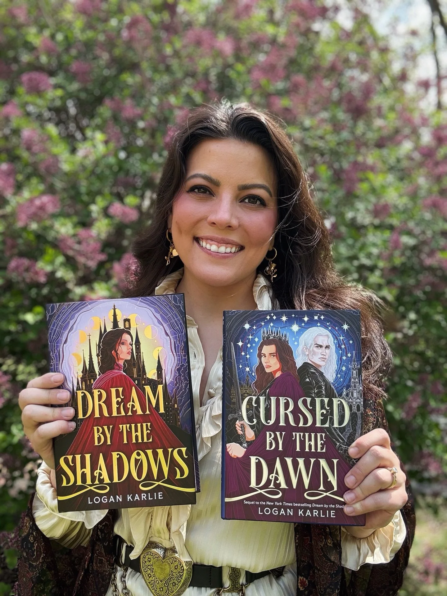 🦋GUYS HERE SHE IS!!!🦋

I woke up to the most gorgeous book on my doorstep &mdash; the stunning deluxe limited edition of Cursed by the Dawn! AND LOOK HOW PRETTY IT IS! The silvery blue foil, the magenta stenciled edges, the blue case design, Esmer 