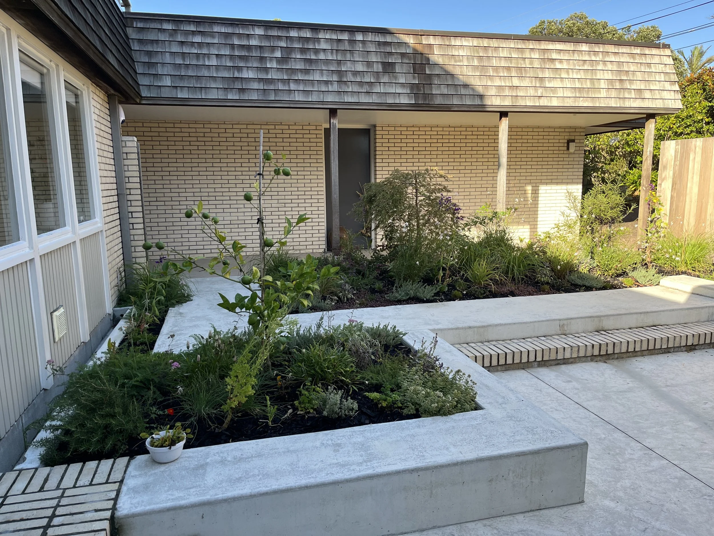 Design: XWD Build: JH Concrete/Recycled Brick