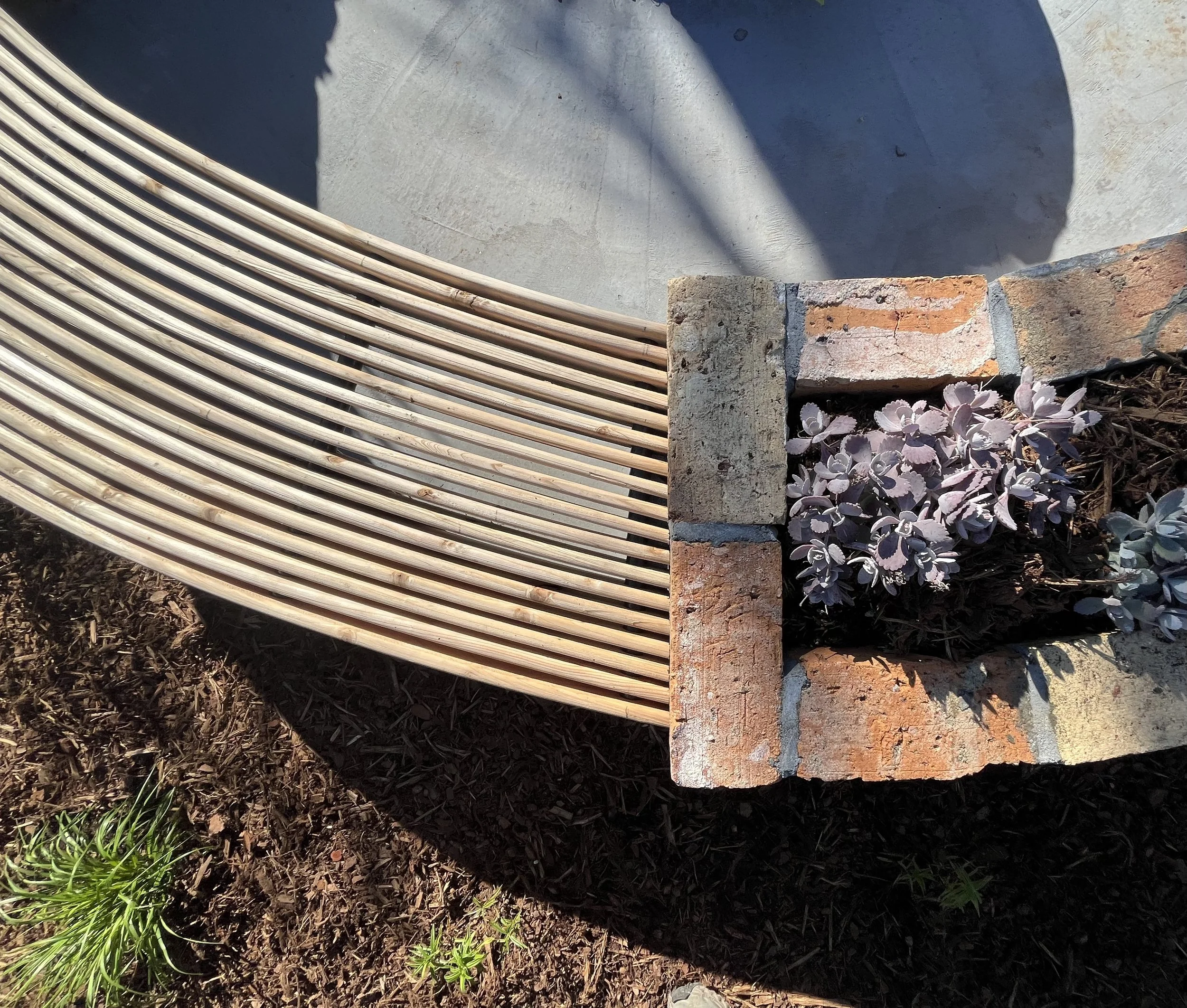 Curved bench seat and planter detail