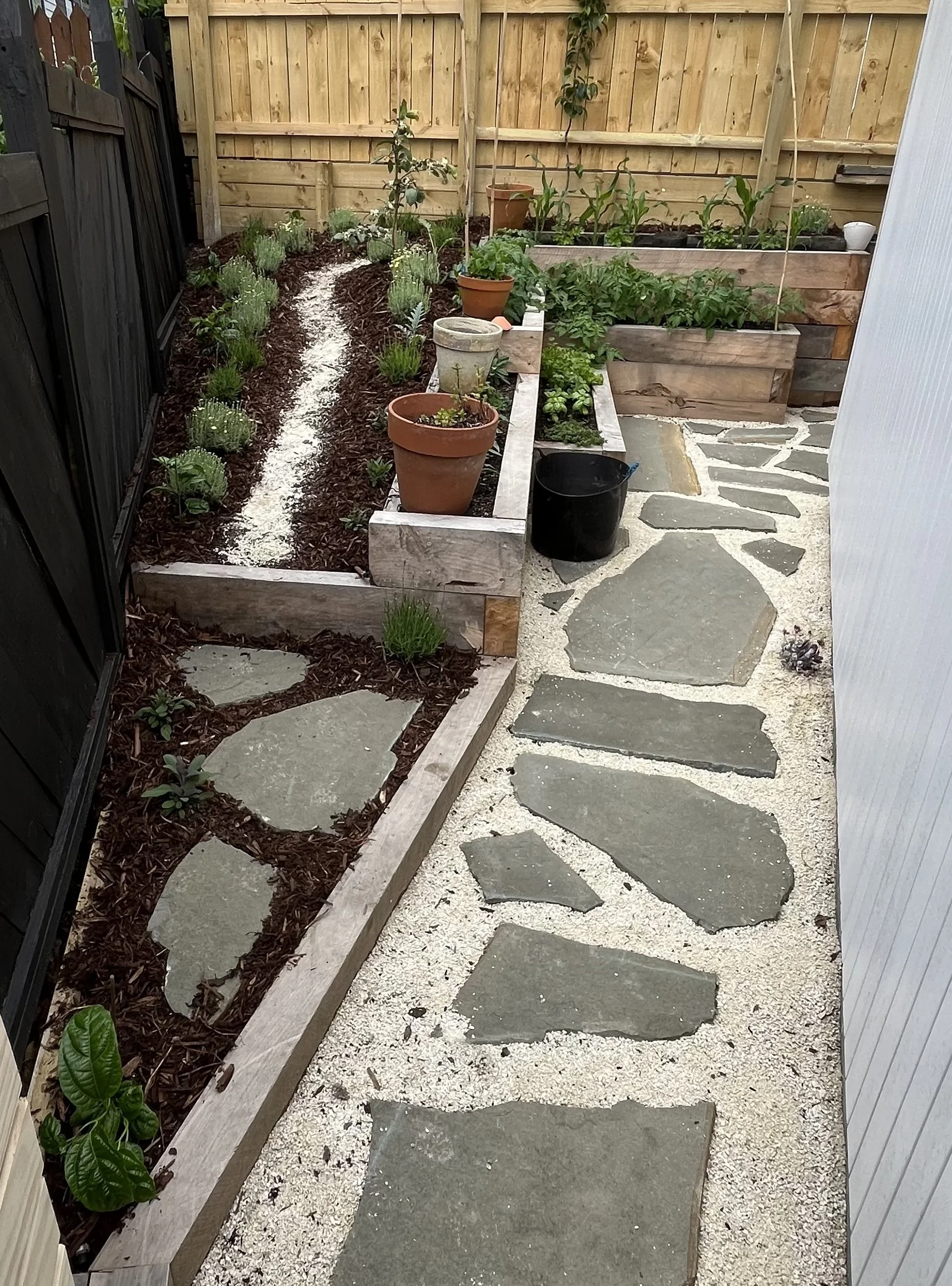 Design: XWD/JH Build: JH, Tricky unused corner of house turned productive.