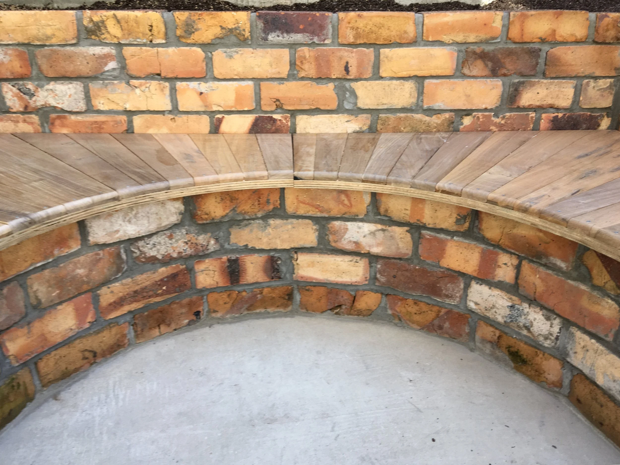 Curved brick seat