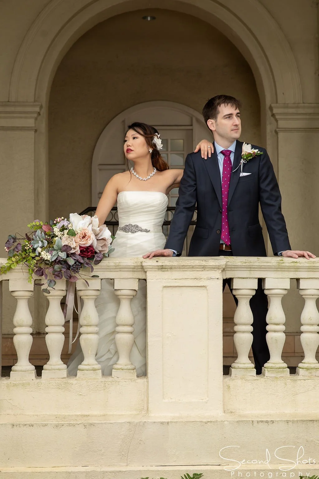 Bride and Groom Photos with Bouquet by Kathy Reynolds wedding florist.jpg