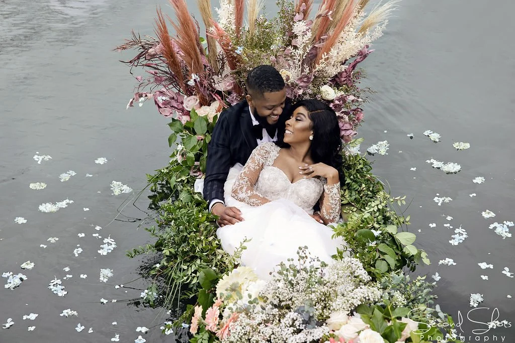 Bridal Photos Boat on water Flower Arrangement by Kathy Reynolds Wedding Florist.jpg