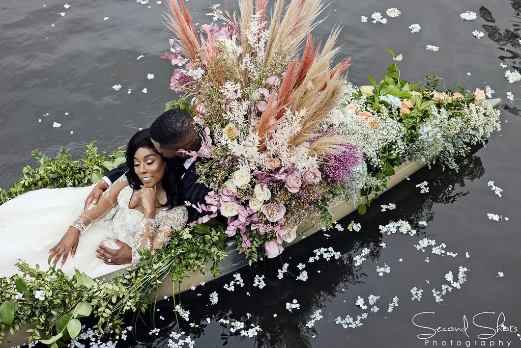 Bridal Floral Shoot couple on the lake flowers by Kathy Reynolds Florist.jpg