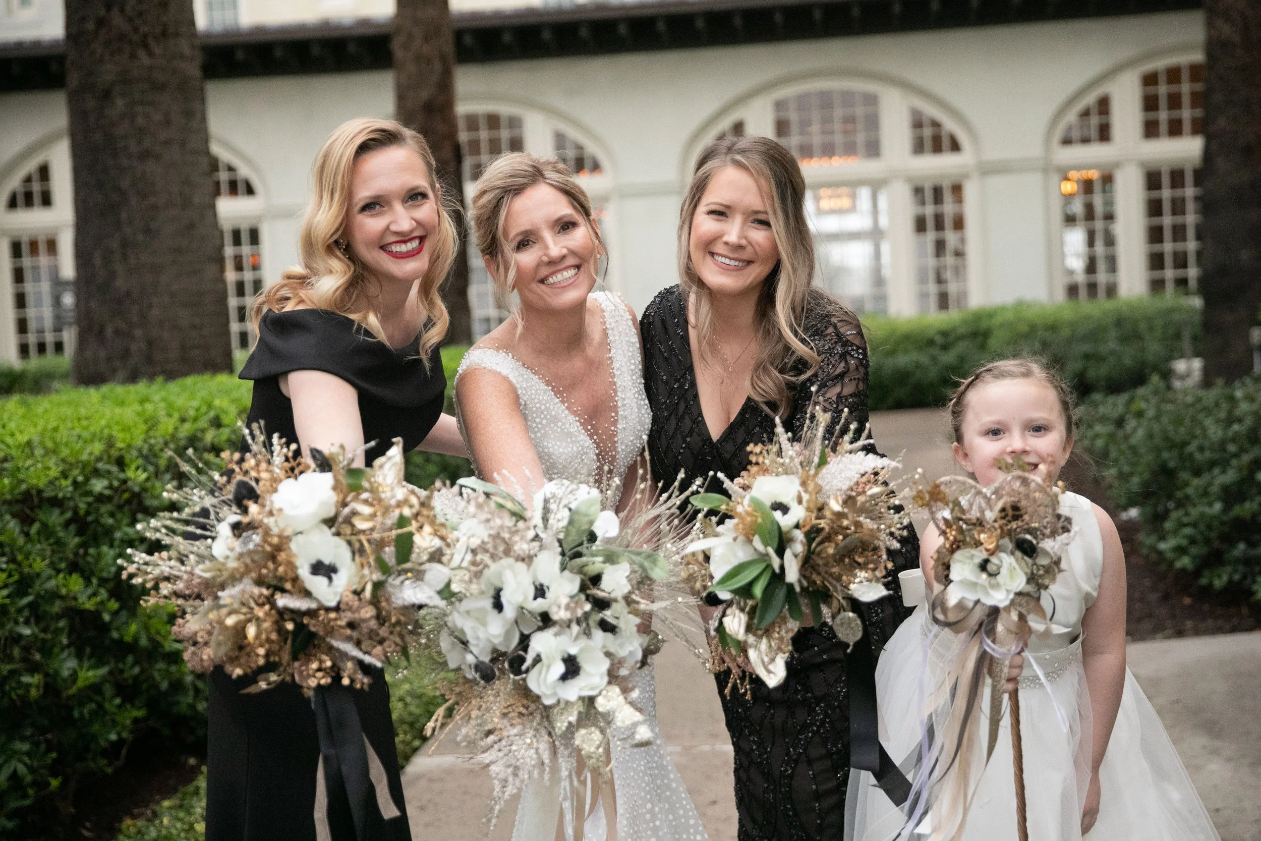 Bride with Brides maid and flower girl with bouquets by Wedding Florist Kathy Reynolds.jpg