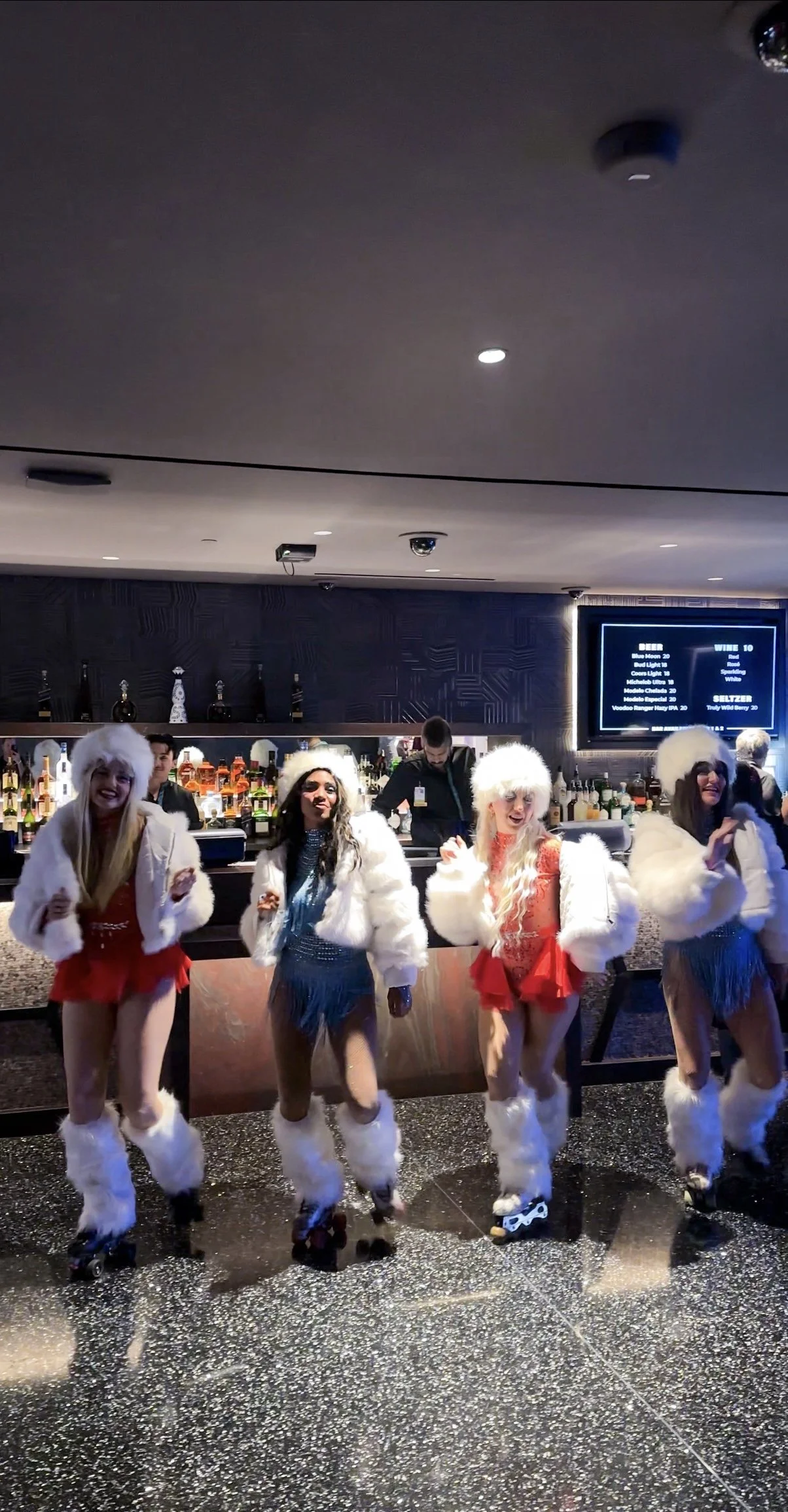 Women roller skating for a holiday party
