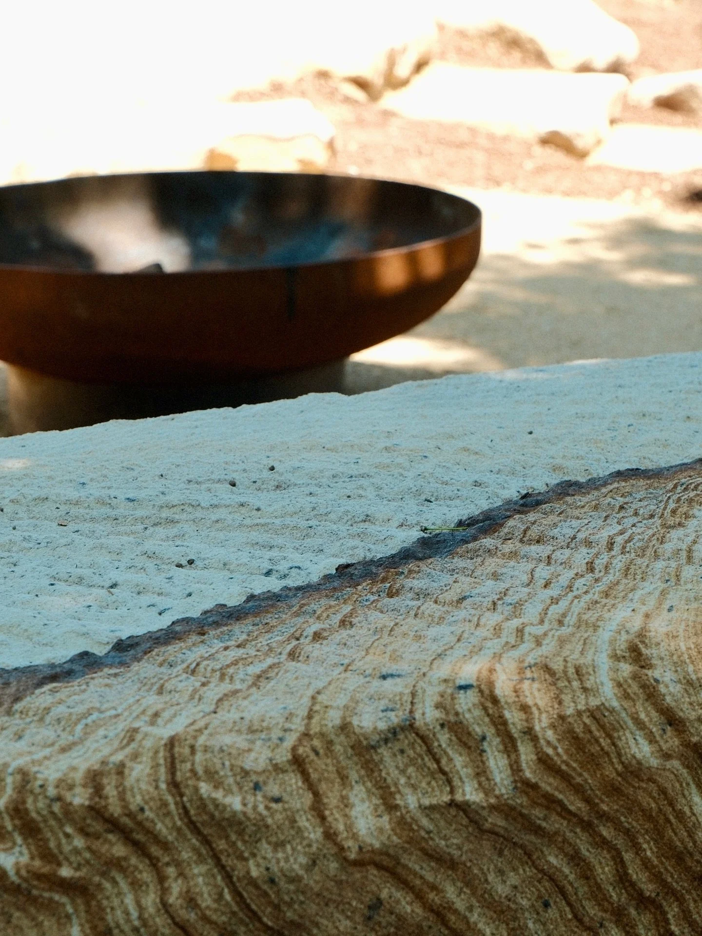 We&rsquo;re big fans of the use of natural stone seating for those nights spent by the fire.