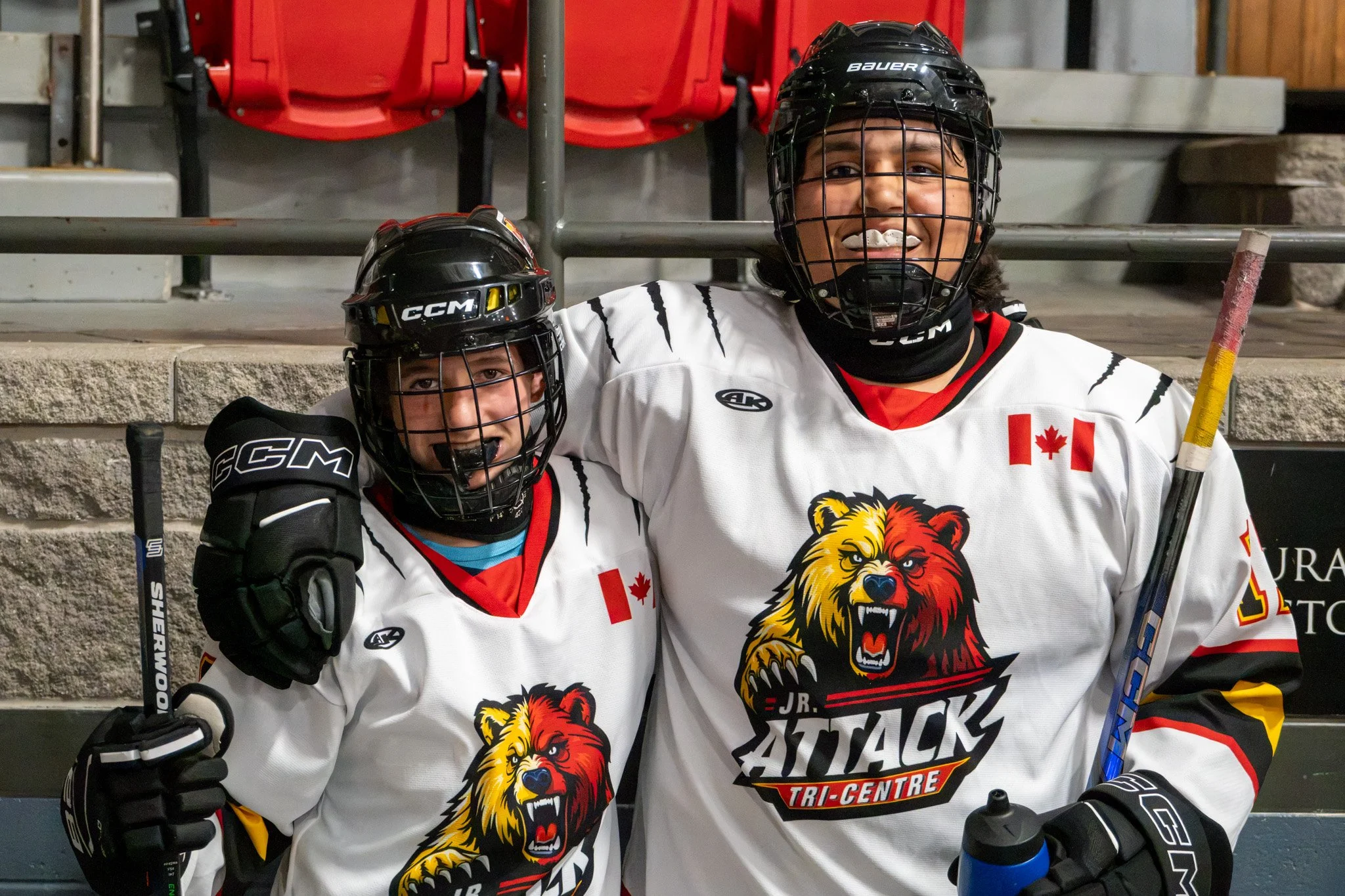 Two Tri-Centre Attack players smiling