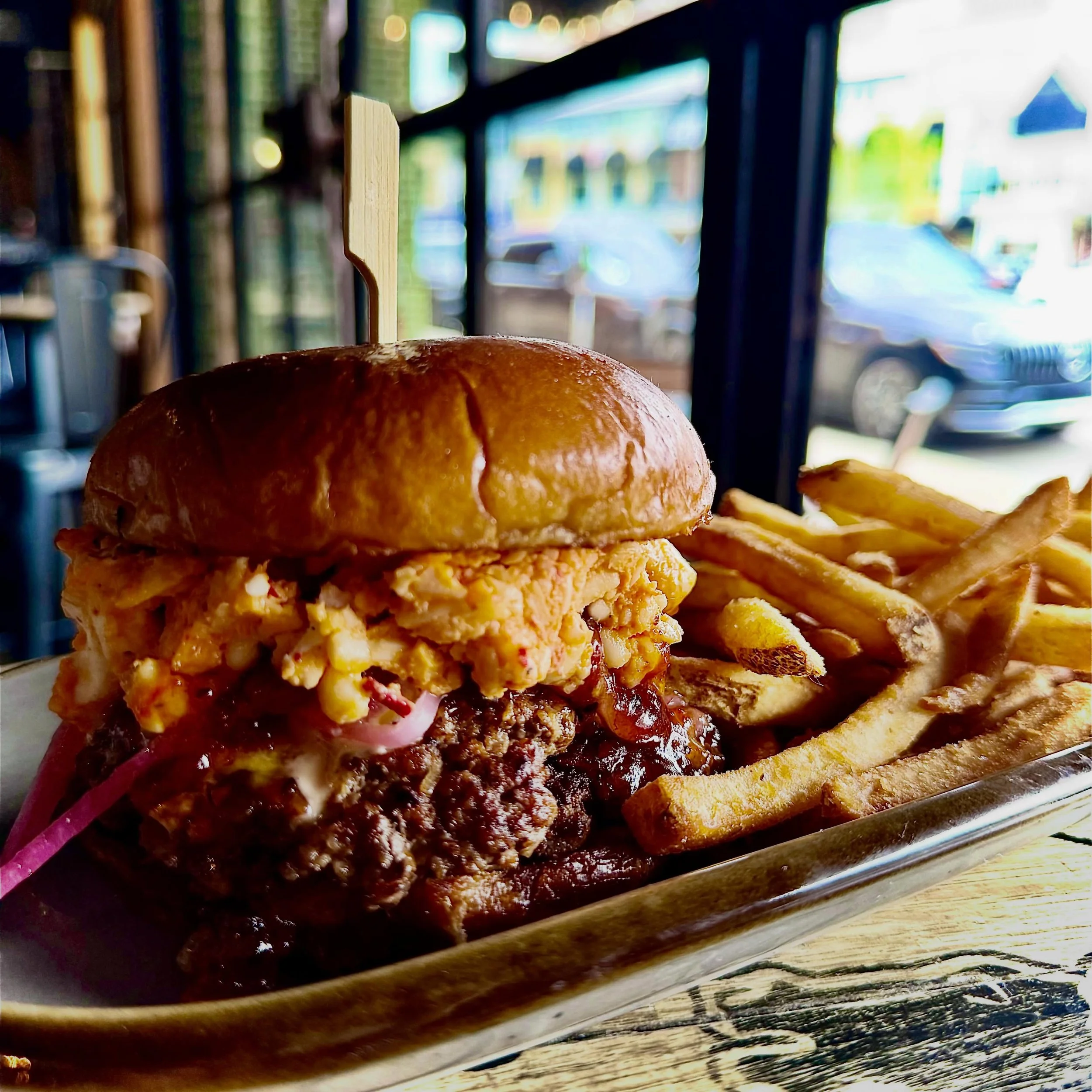 🚨 Our new menu releases TODAY! 🚨 Some featured items are: Elote Street Corn Dip, Pulled Pork Sandwich with Honey Apple Fennel Slaw and Truffle Aioli, Southwest Salad with Grilled Chicken, and Pimento Burger with Pepper Bacon Jam. BUT, we are confid