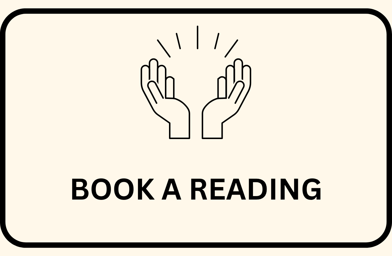 Sign with a graphic of two hands holding a book and the text "BOOK A READING"
