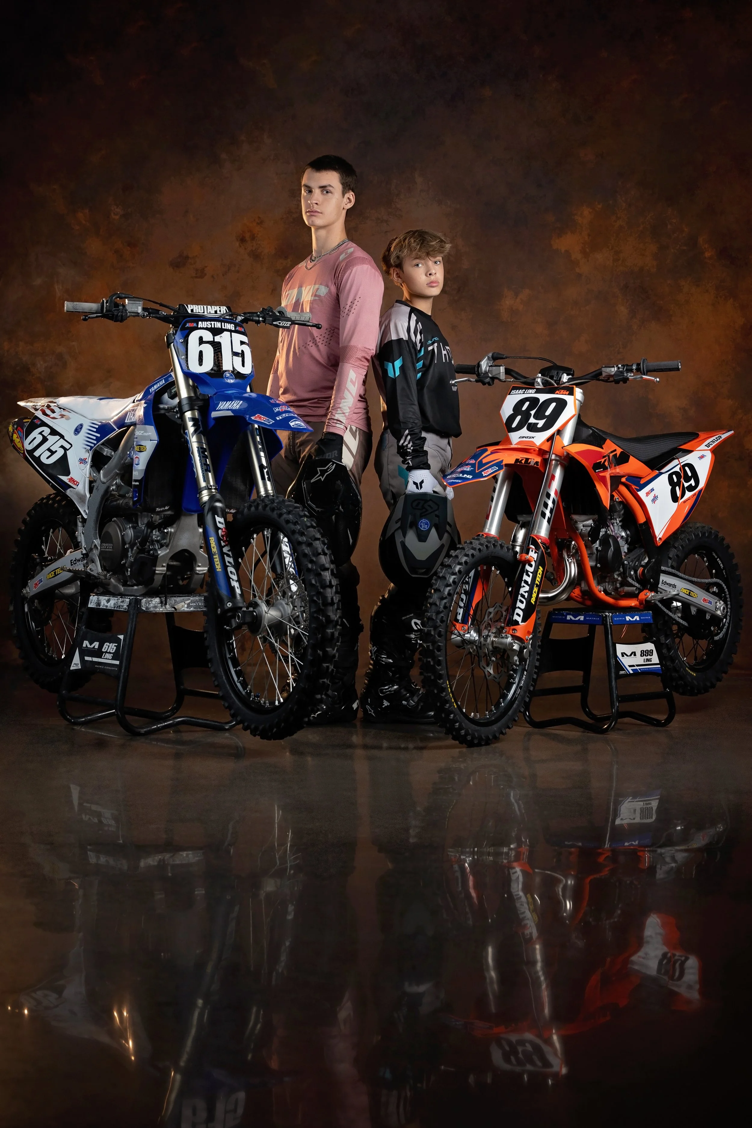 Brothers pose with their dirt bikes at their Beyond the Game Session in Gretna, Nebraska