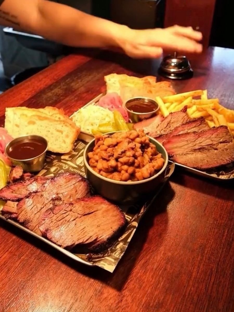 Monday deal at Village Kitchen Samford, Brisbane— 2 for 1 Brisket Pork Sausage Ribs Platter - Dine-in Specials Village ktichen