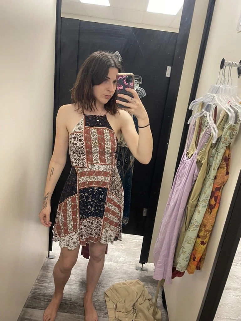 I went shopping for travel clothes. At this point I did not own any dresses anymore, but I was trying to warm back up to my feminine energy. This was a breakthrough moment.
