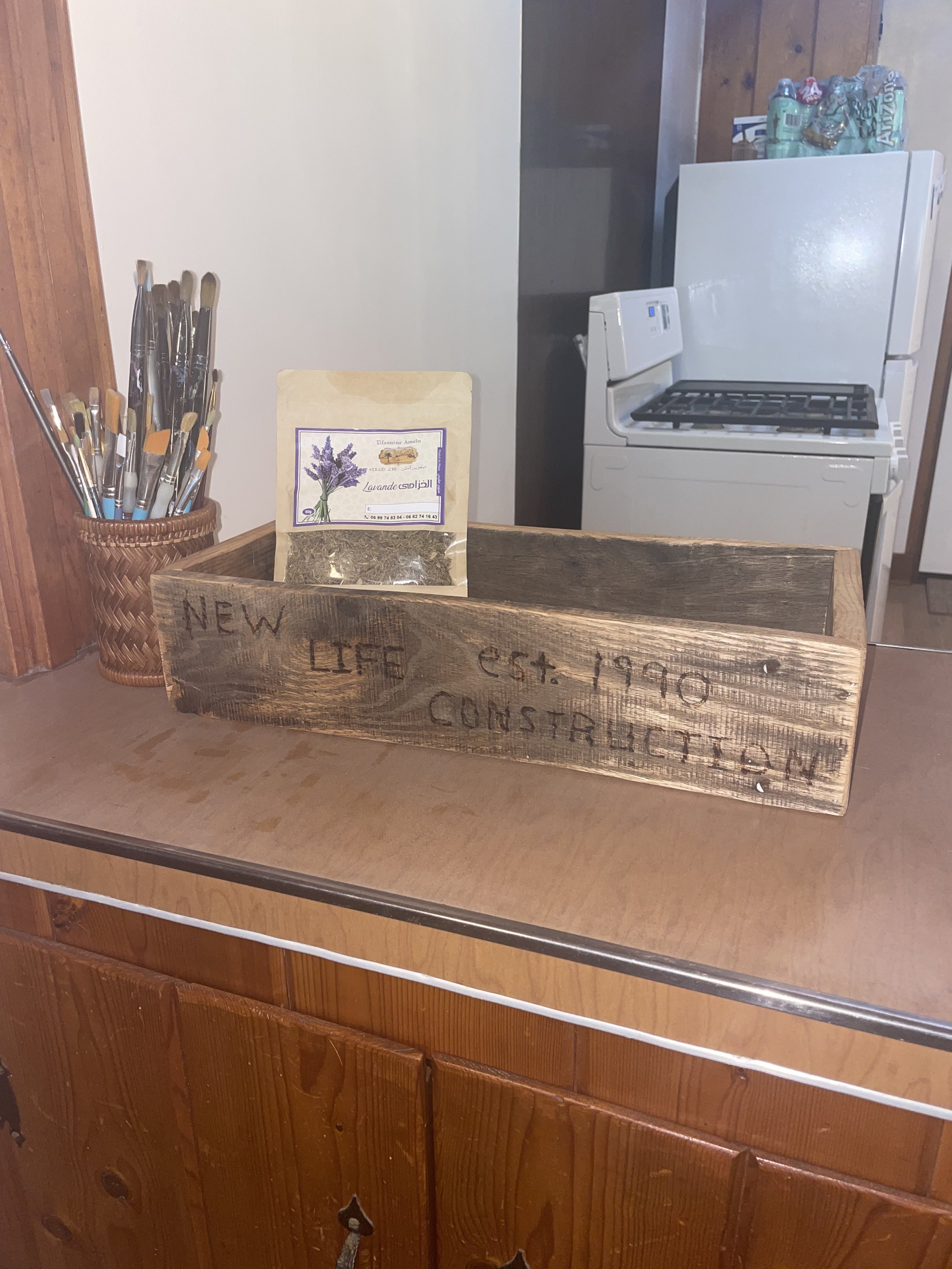 I found this random cute box at a garage sale that said "New Life Construction." The woman said her husband had carved the phrase because that was the name of their construction company. But for me, it seemed like a beautiful marker of this new chapt
