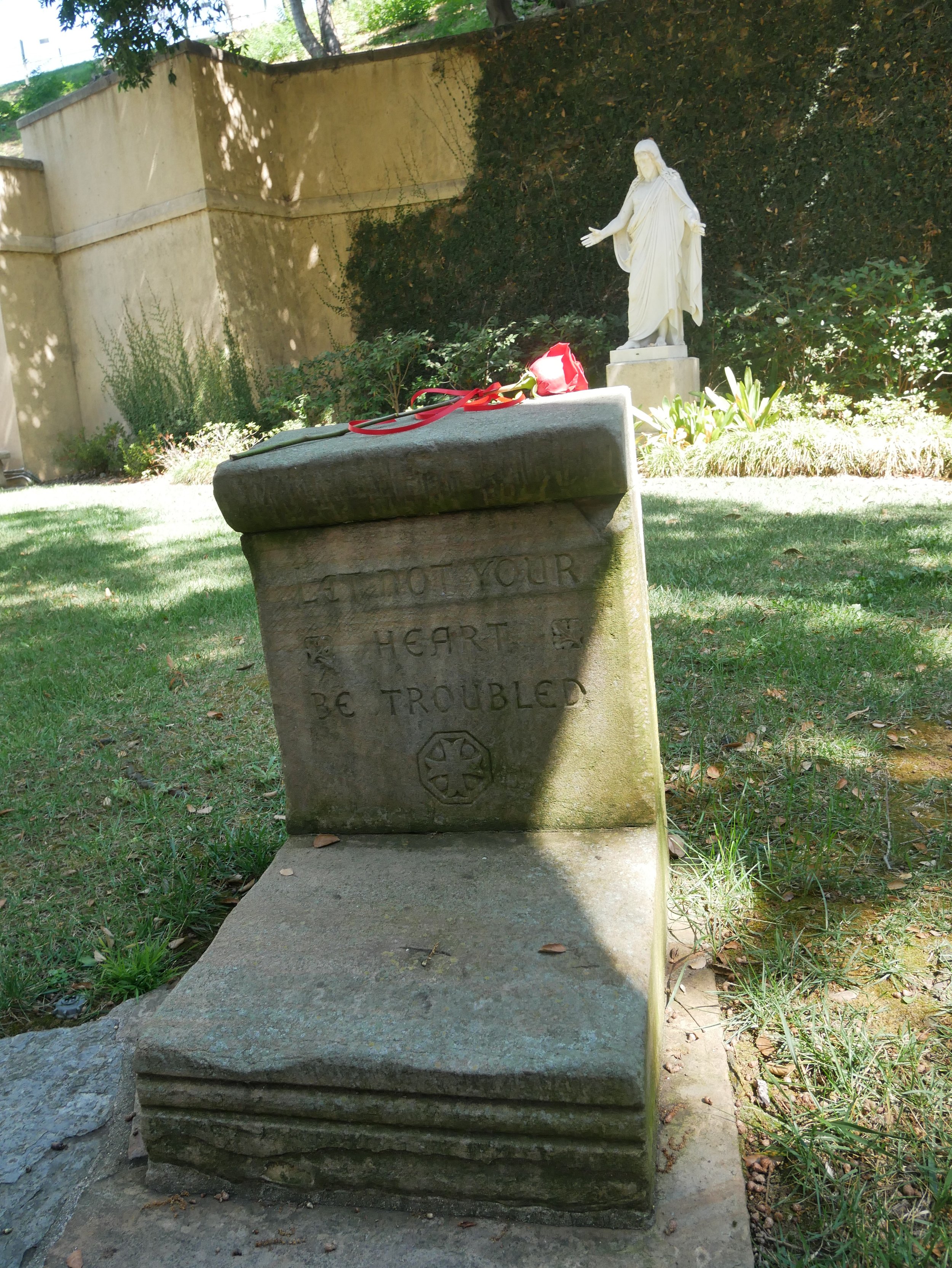 "Let not your heart be troubled" inscribed on the kneeler.