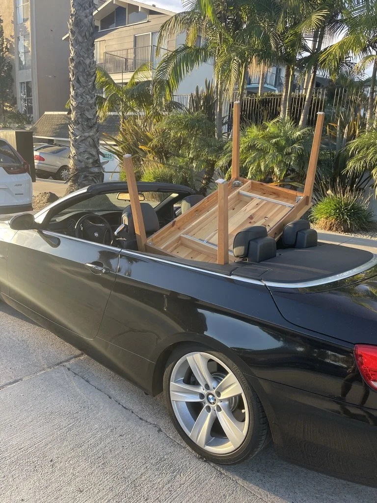 This buyer was determined to fit my old desk into his convertible!