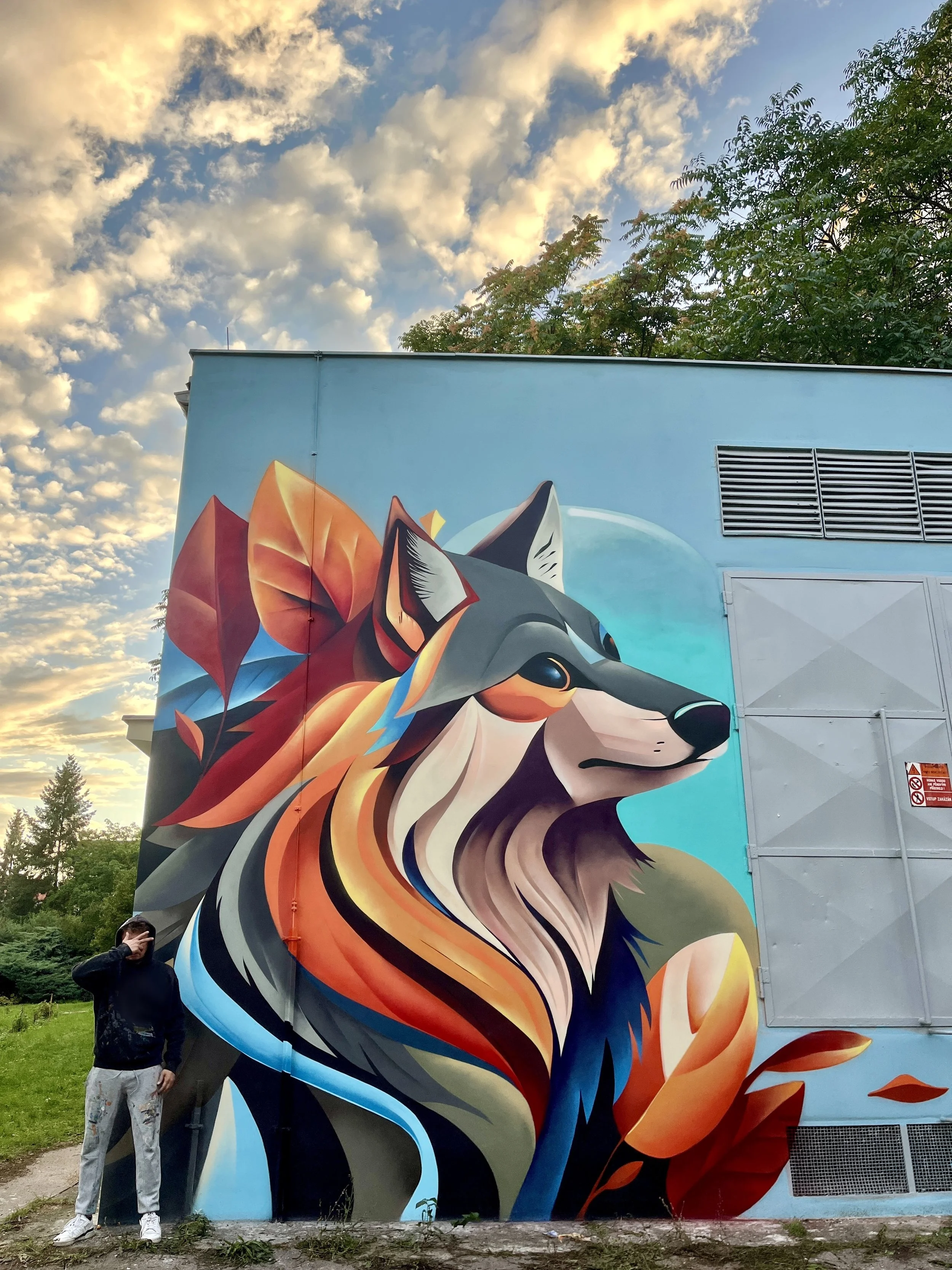 A wolf in autumn colors, spray paint wall art.