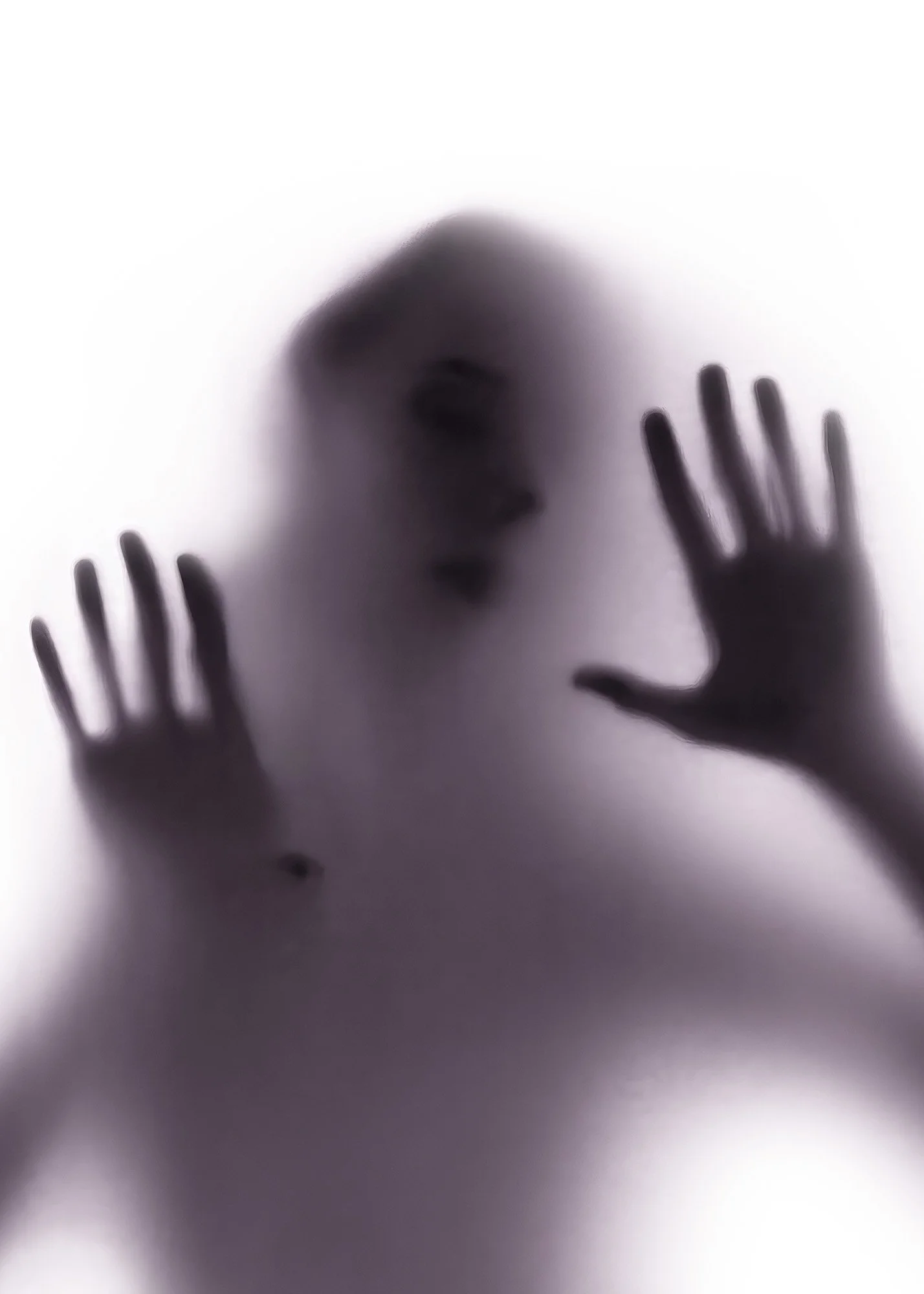 A silhouette of a person pressing their hands against a semi-transparent surface, with their face and hands blurred and distorted behind the surface.