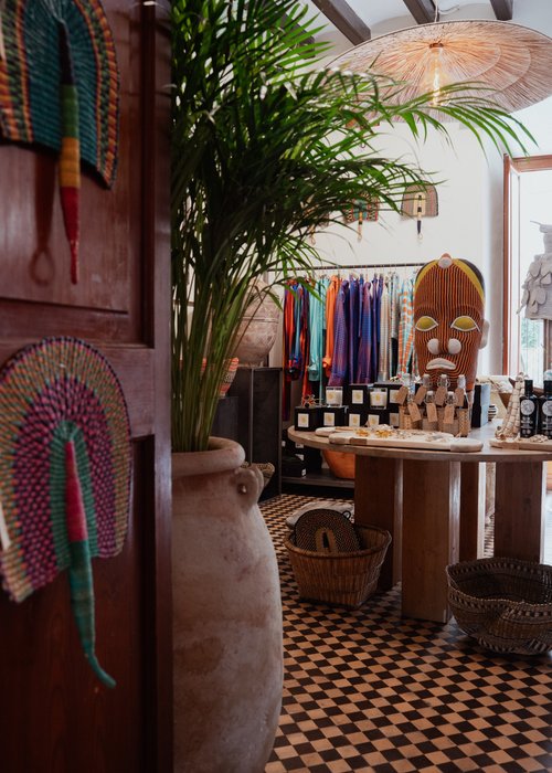 One of the salons, with a palm in the corner