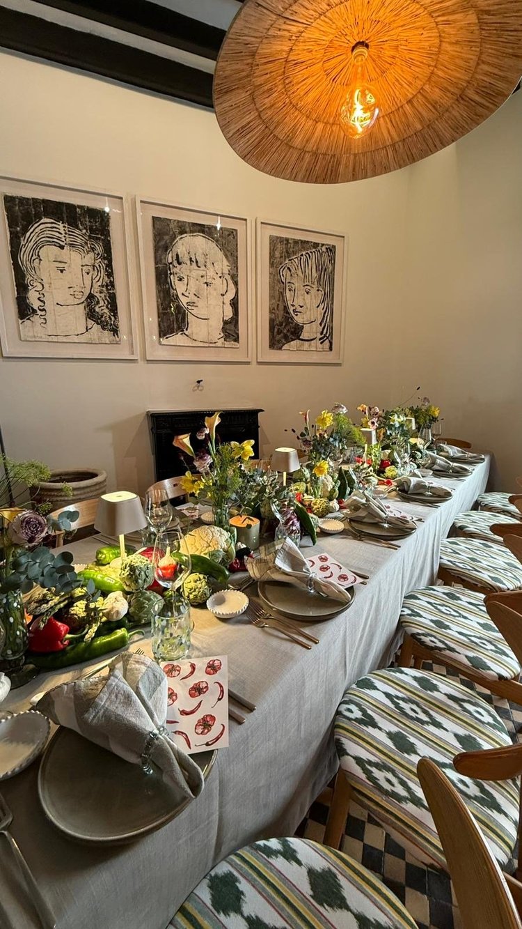 A long table set for a private dinner in one of the private rooms at Chez Junior Sóller