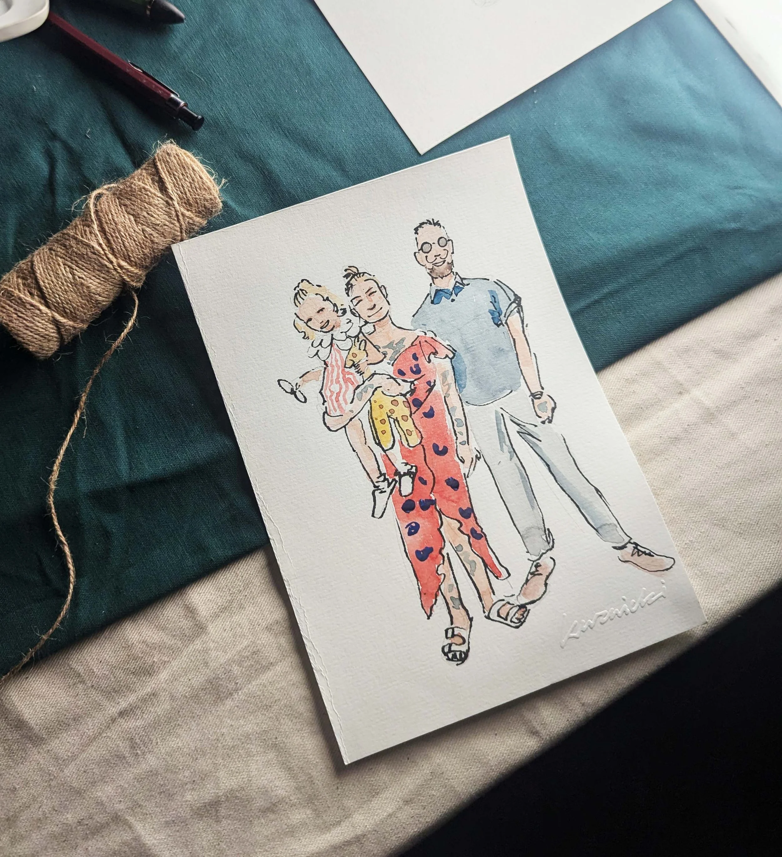 A watercolor illustration of three people standing together, with a woman in the middle holding a small dog. The person on the right is a man wearing glasses and a light blue shirt, and the person on the left is a woman with blonde hair, wearing a pa