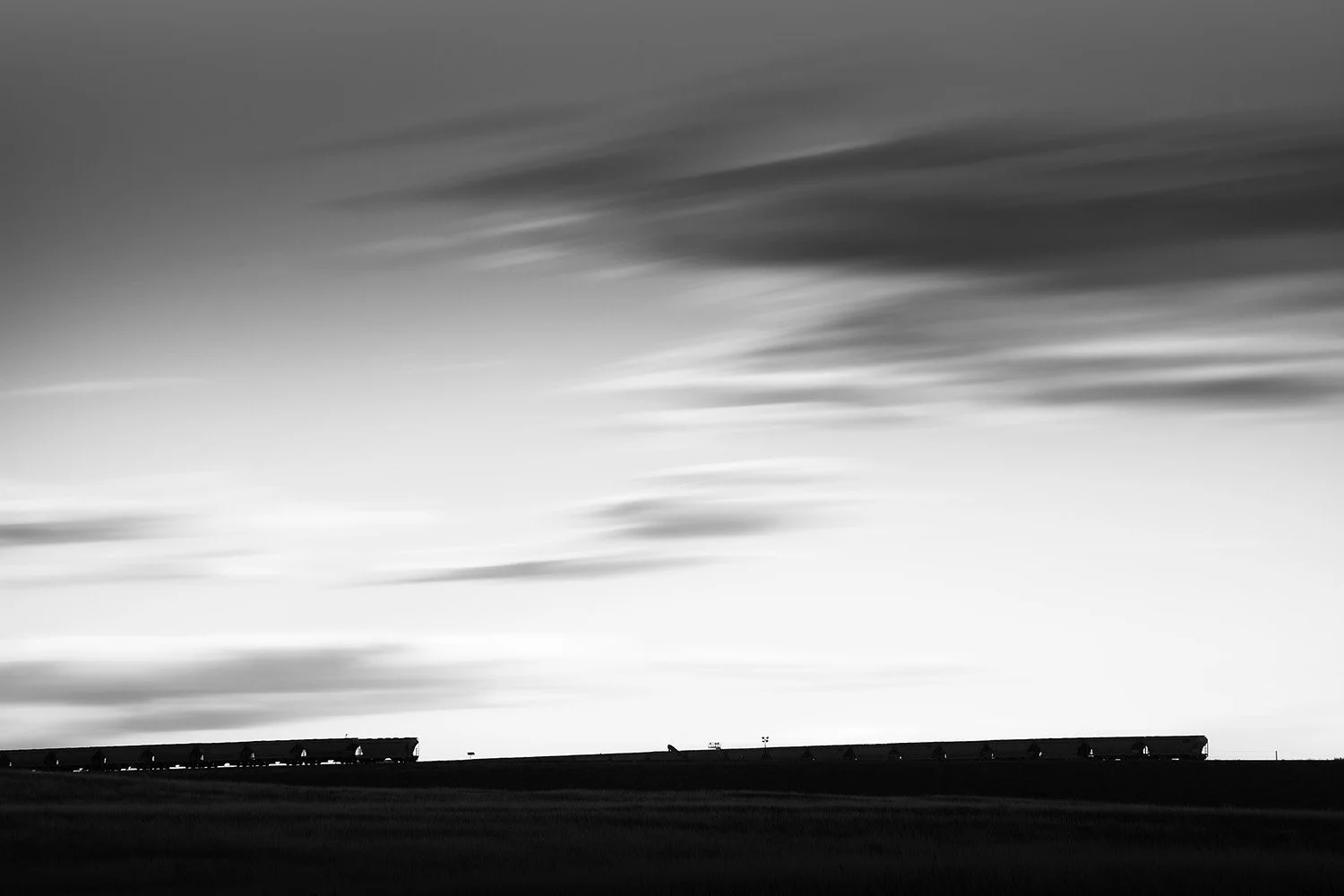 Lines of Cars and Lines of Clouds