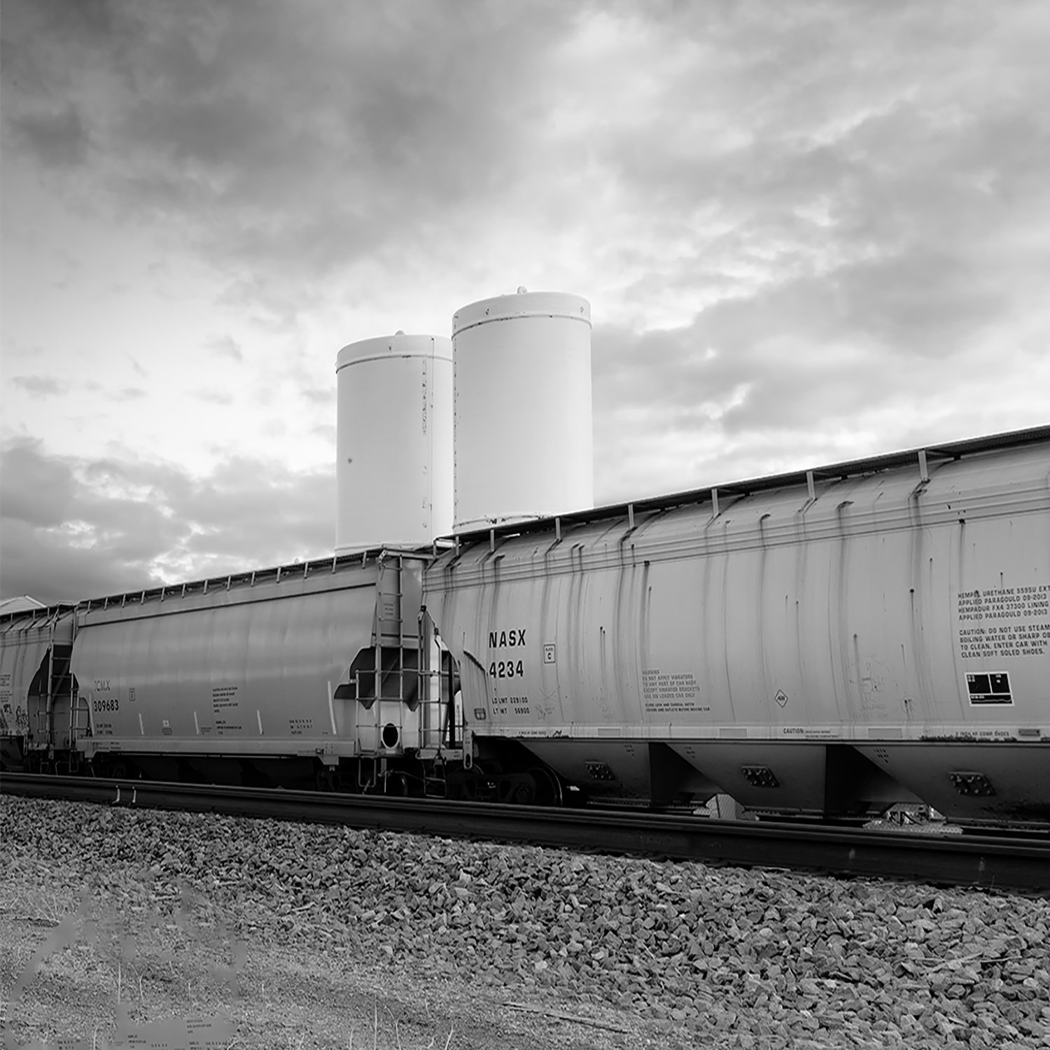 Three Cars and Two Tanks
