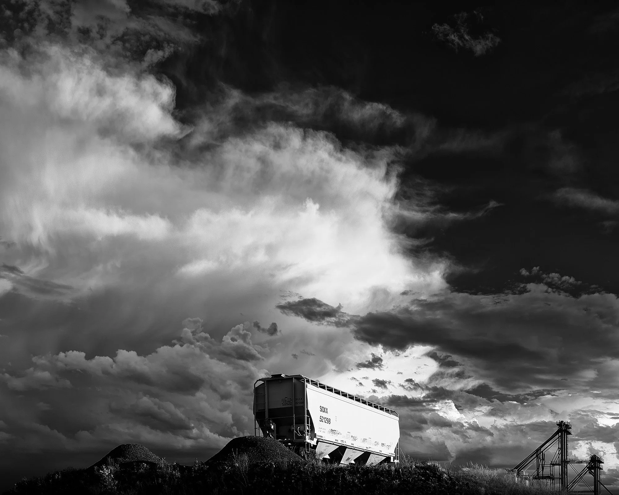 Railroad Car and Cloud Bank