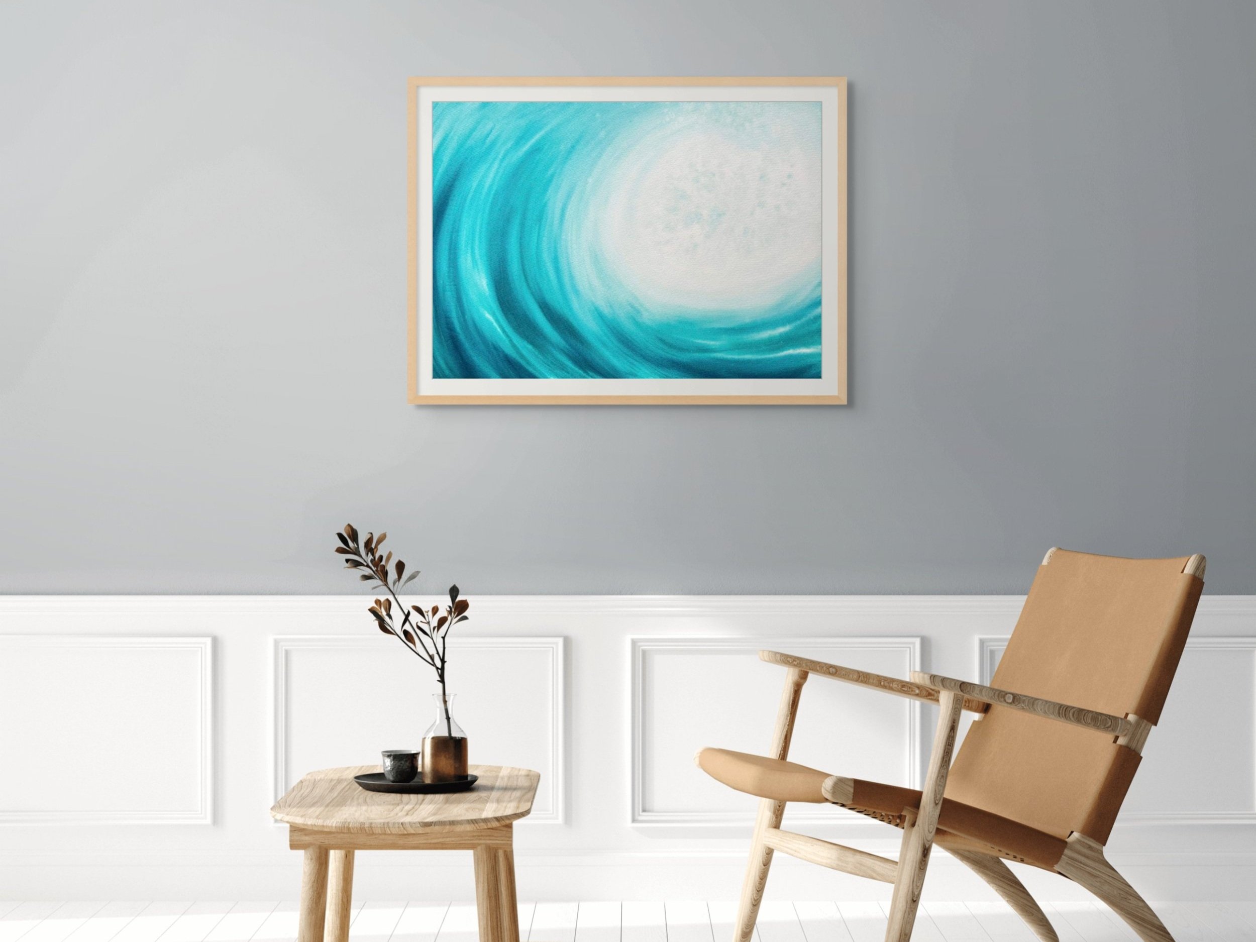 Framed watercolor painting "Blue Serenity" staged in a modern living room. Elegant and calming wave art for a serene atmosphere.