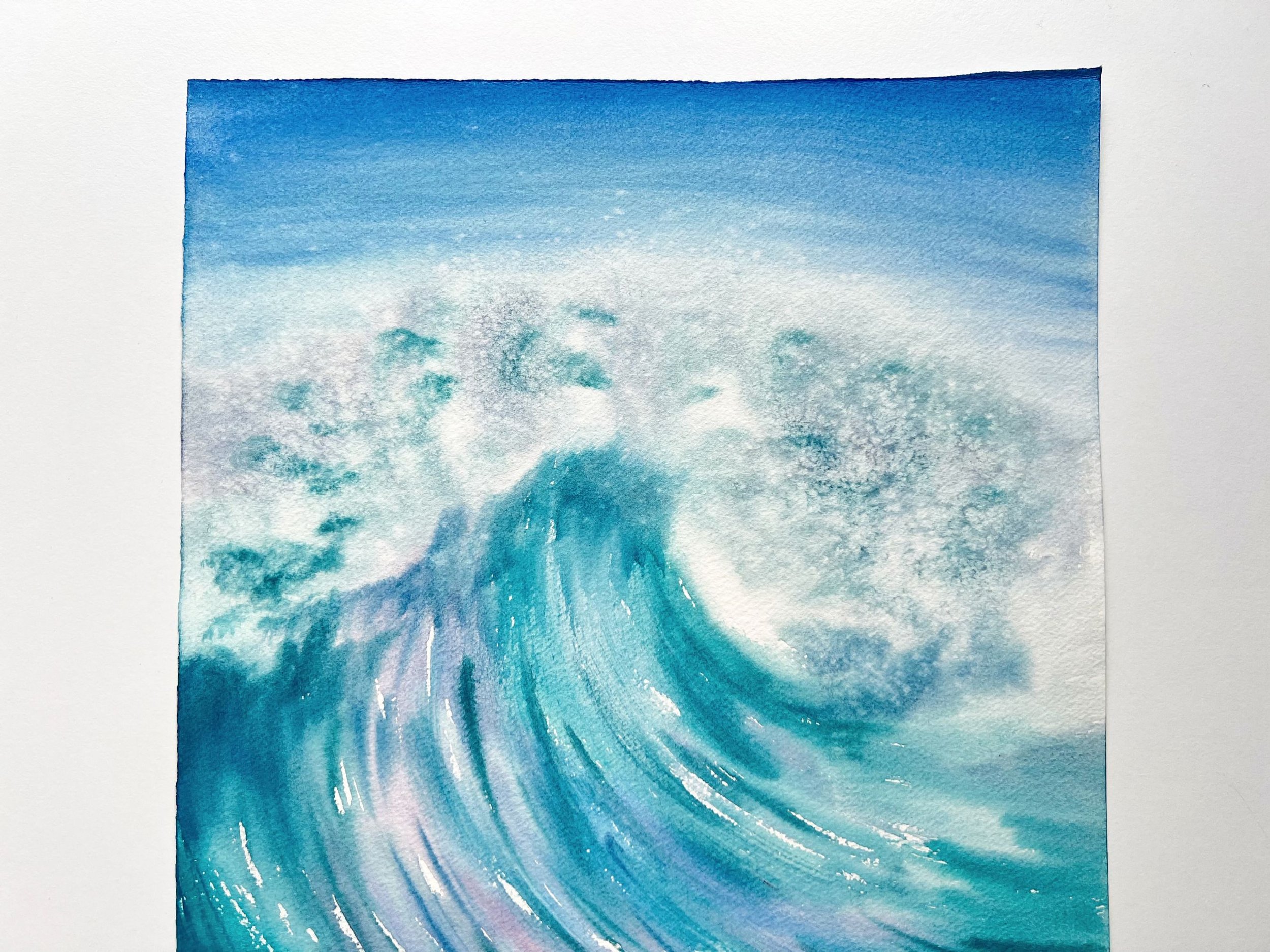 Splash of Colour is an original watercolor celebrating the ocean's untamed power in bold blues, pinks, and purples create dynamic energy.