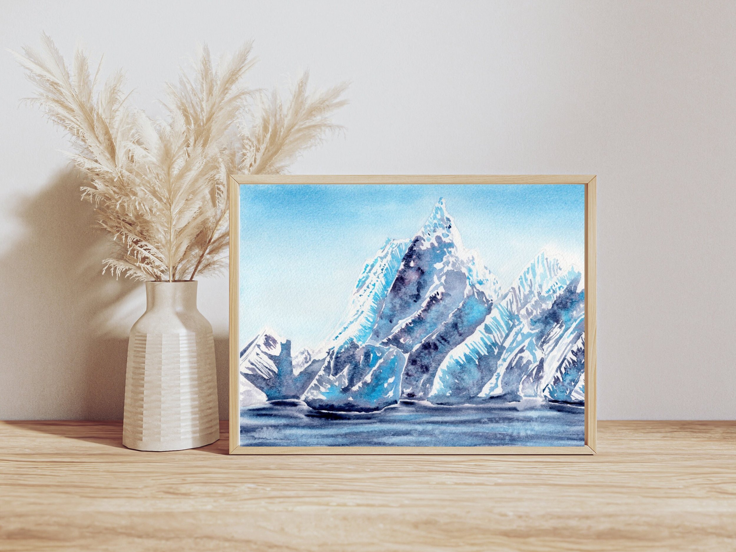 Cobalt Glacier Giclée Fine Art Print is Watercolor that Transports You to a Mountain Wonderland. on a Shelf setting