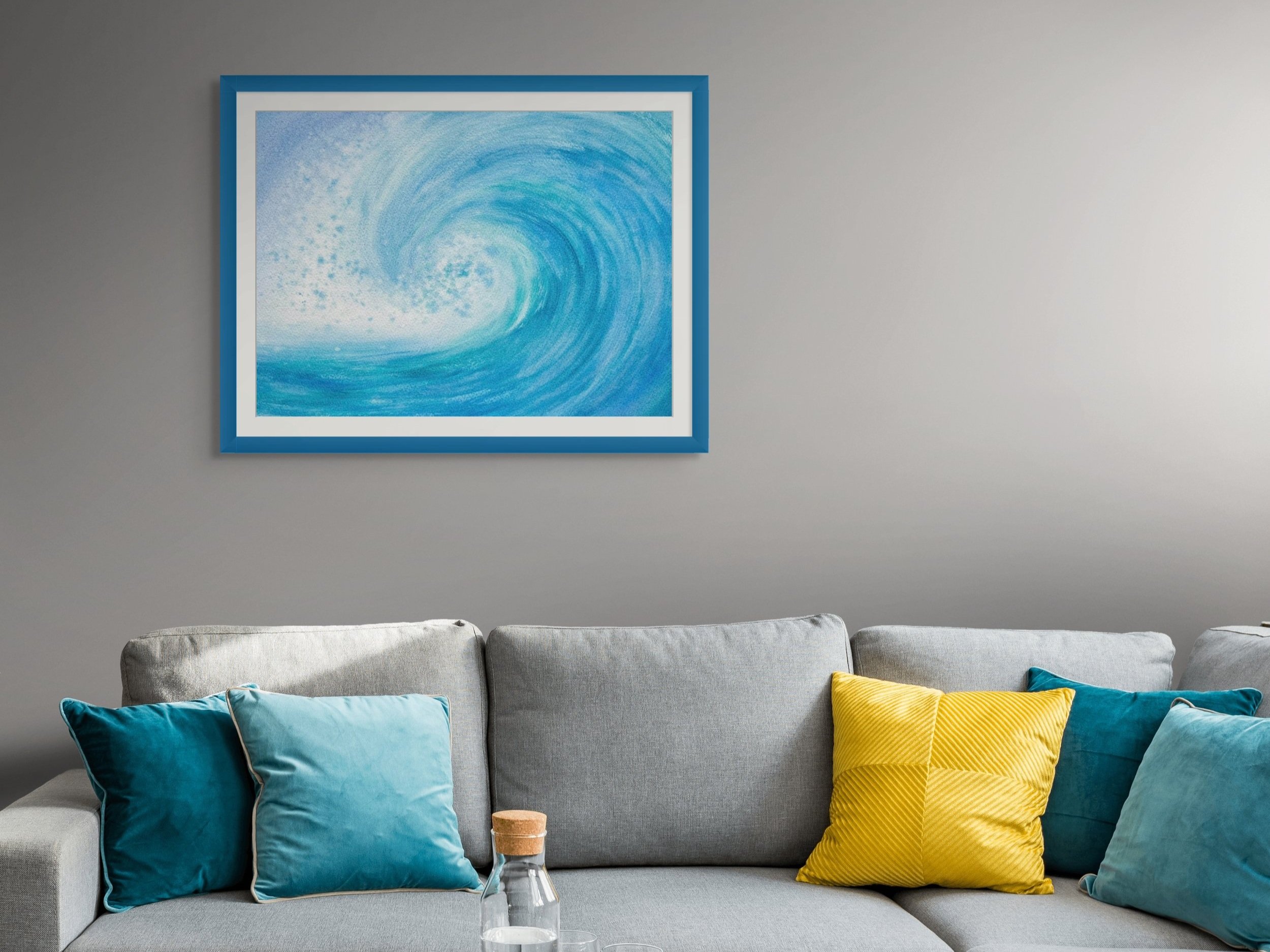 A room set up of "Time for Surfing" original watercolor painting that captures the thrill and energy of the sea. A dynamic painting of a powerful wave, perfect for ocean lovers.