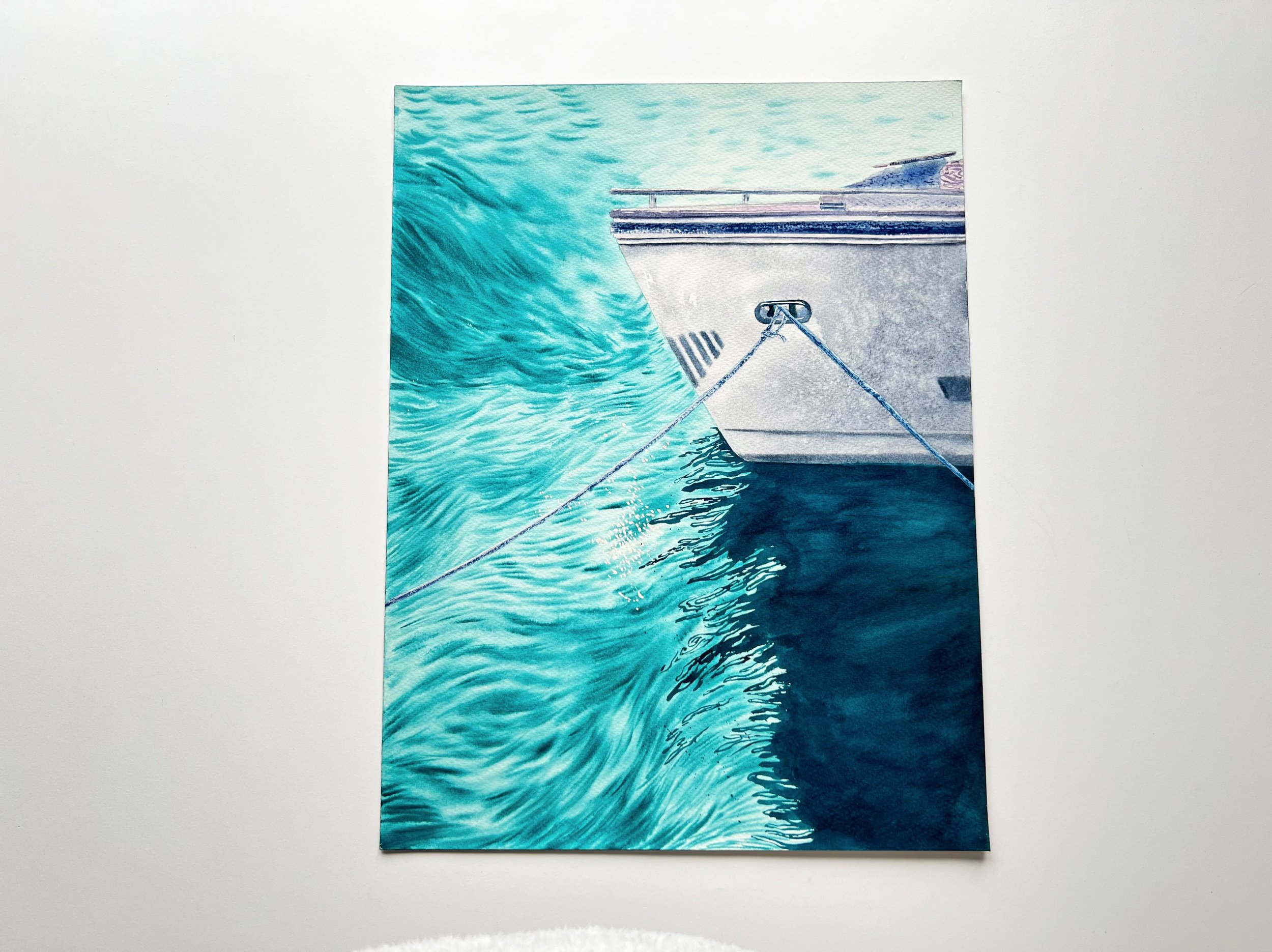 Closeup of the original watercolor painting "Wind" showcasing a majestic boat with choppy water, rope details, and shimmering reflections.
