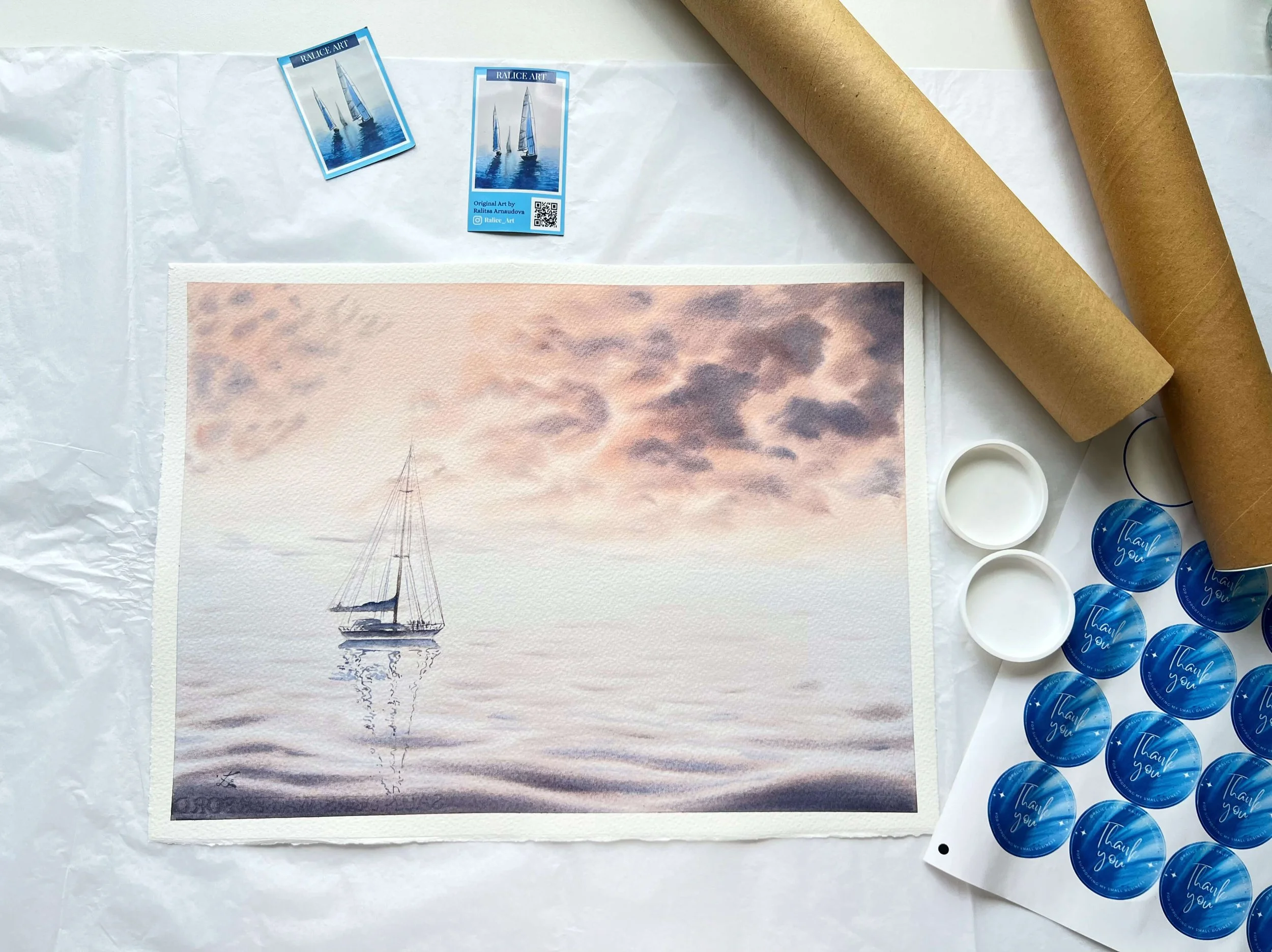 photo ot ralice art packaging including acid free tissue paper to cover the paintings, cardboard tubes with plastic caps  and fridge magnets 2.jpg (Copy)