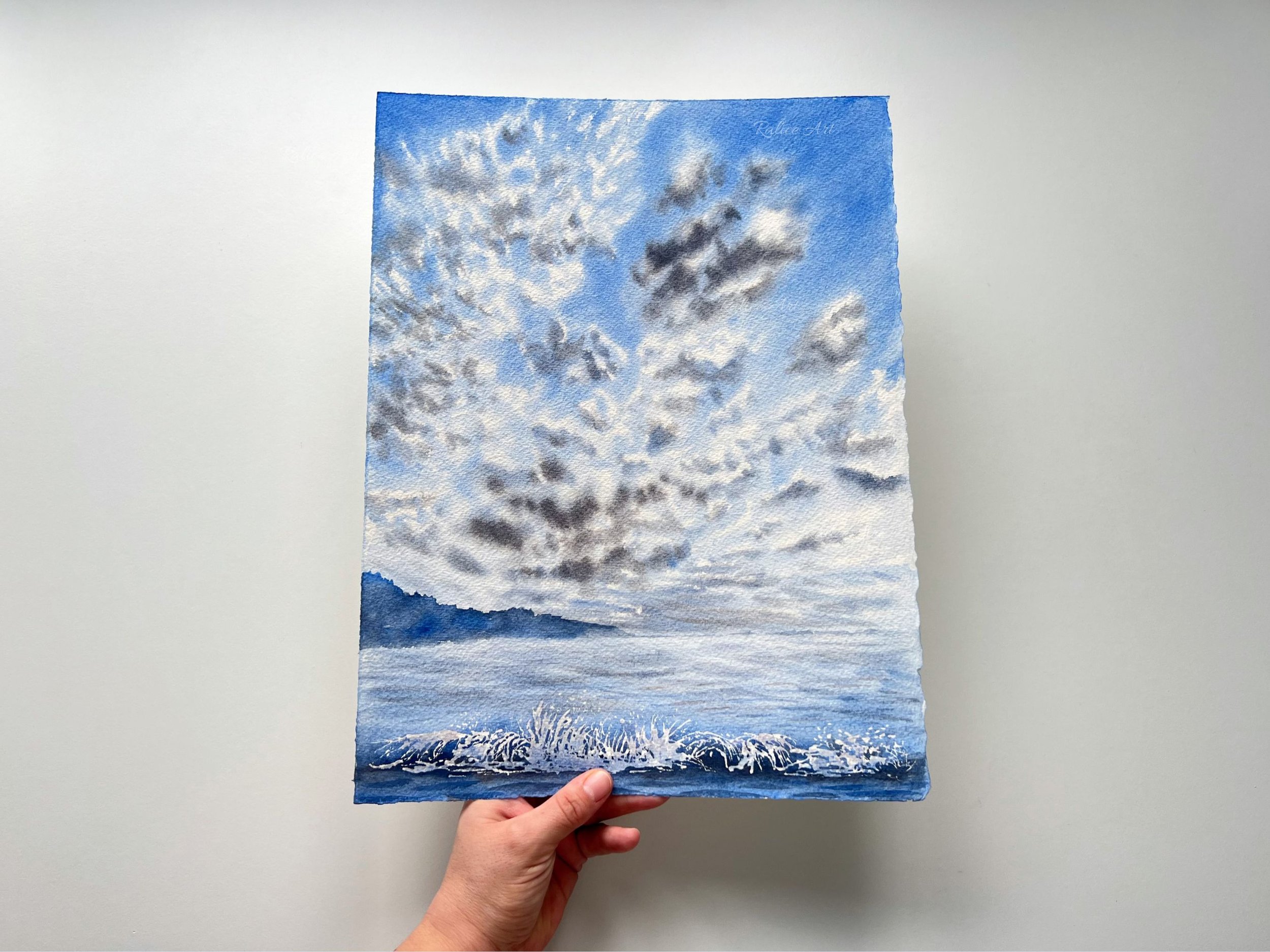 Fluffy Cirrocummulus Clouds Original Watercolour Painting on Paper by Ralitsa Arnaudova Ralice Art unframed closeup in my hand