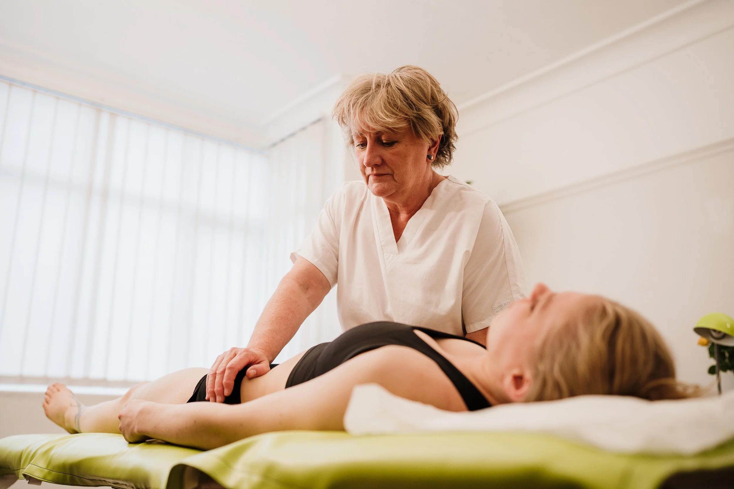 osteopath for women's health in treatment room in Bristol
