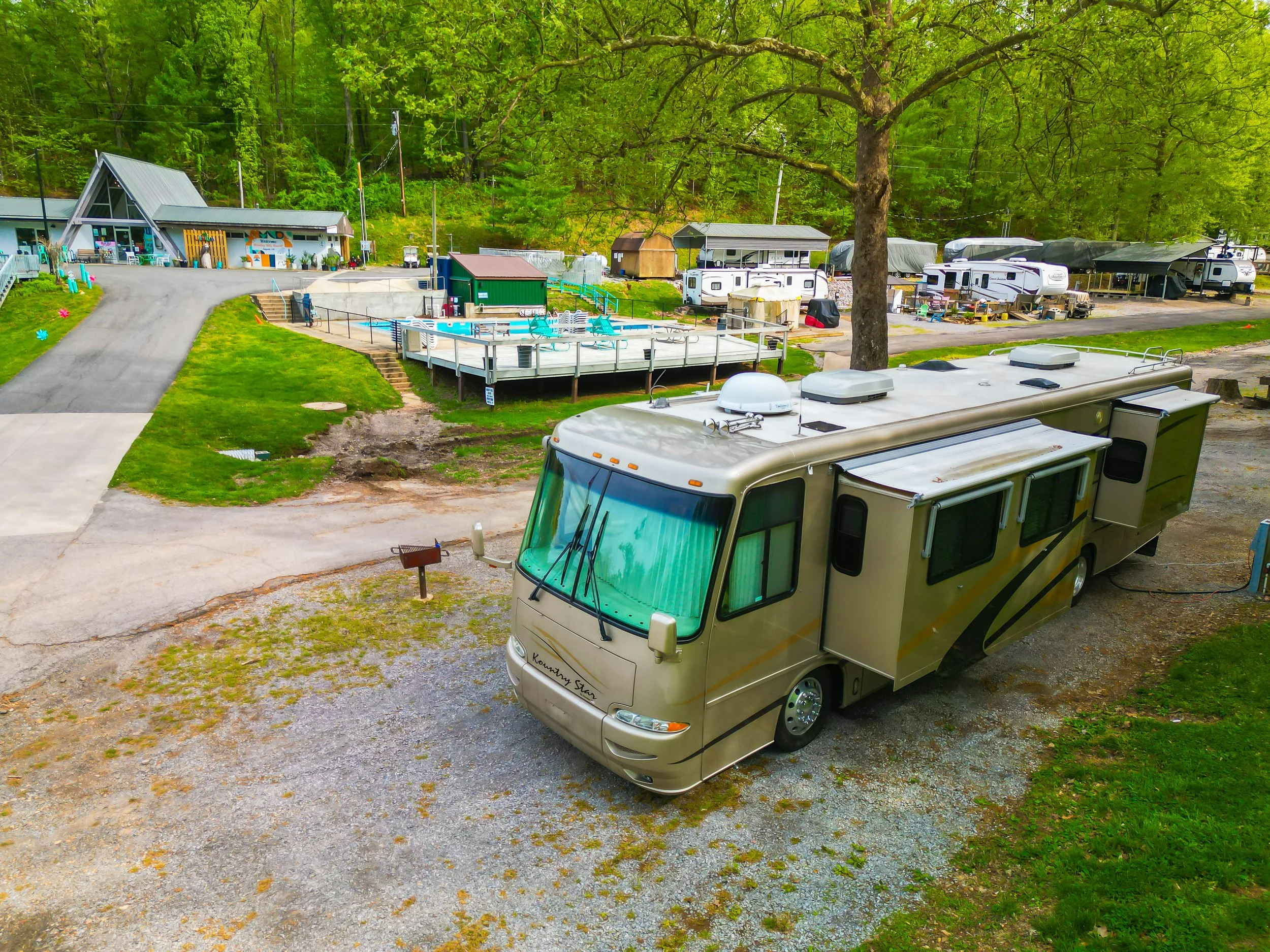 Lakeview campsite 47 with a view of the seasonal pool at holiday hills resort on lake barkley near land between the lakes