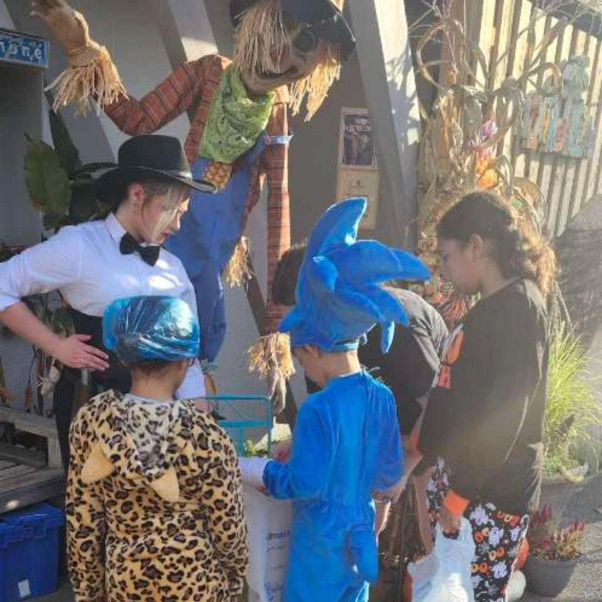 Guests enjoying Halloween festivities at Holiday Hills Resort with seasonal decorations and activities.