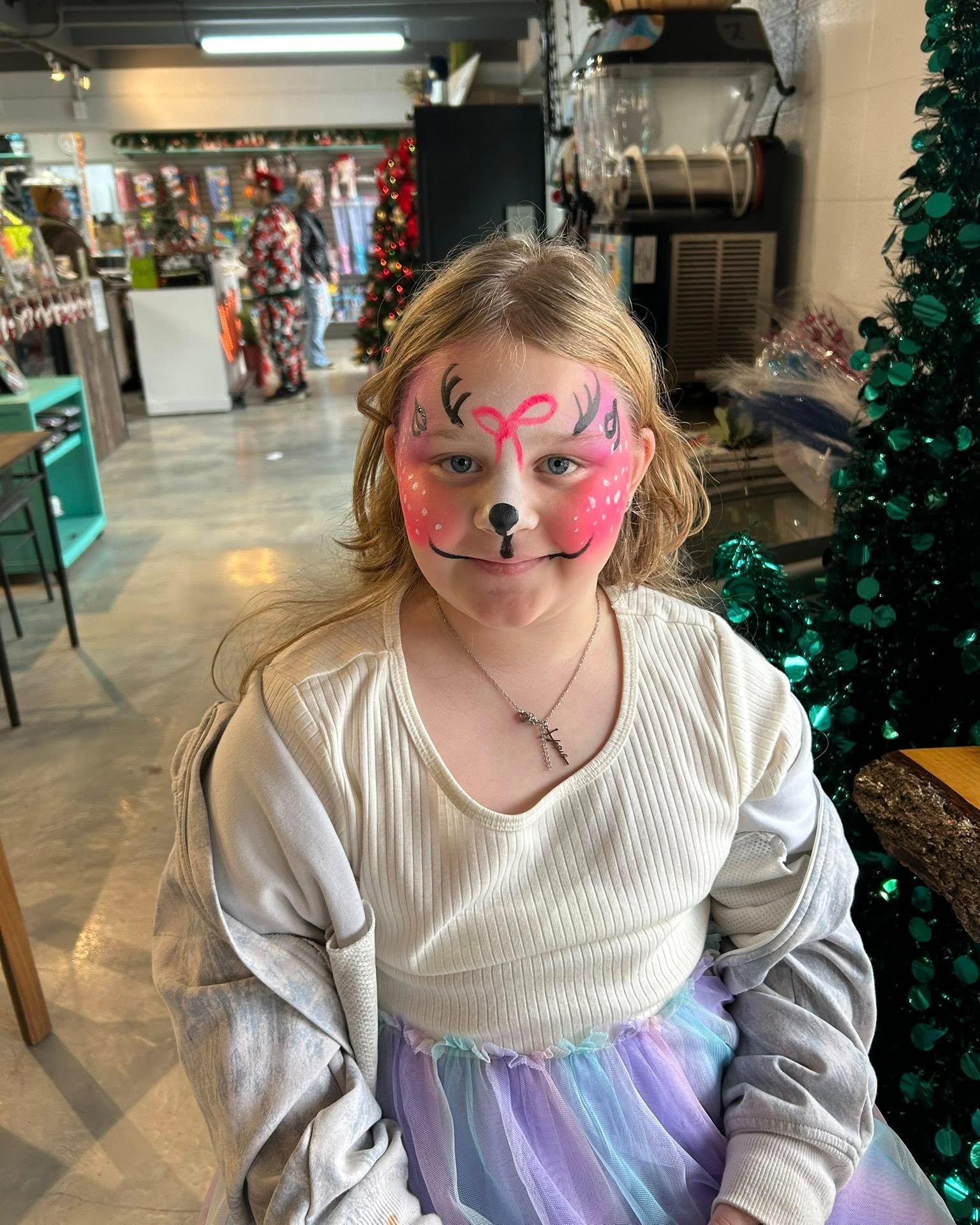 Children having their faces painted during the Holiday Hills Resort Christmas Extravaganza event.