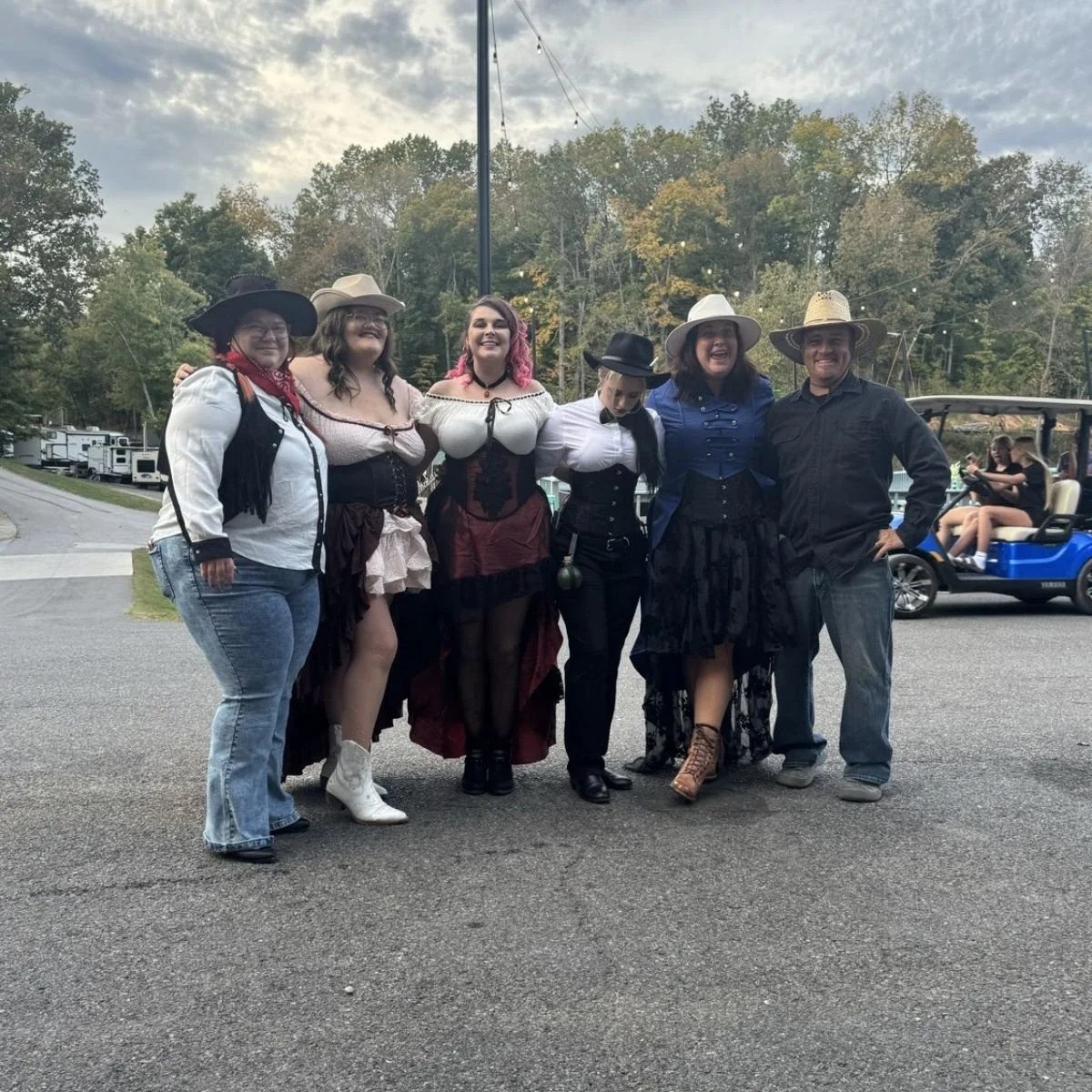 Holiday Hills Resort staff dressed in rodeo outfits entertaining guests during a weekend activity.