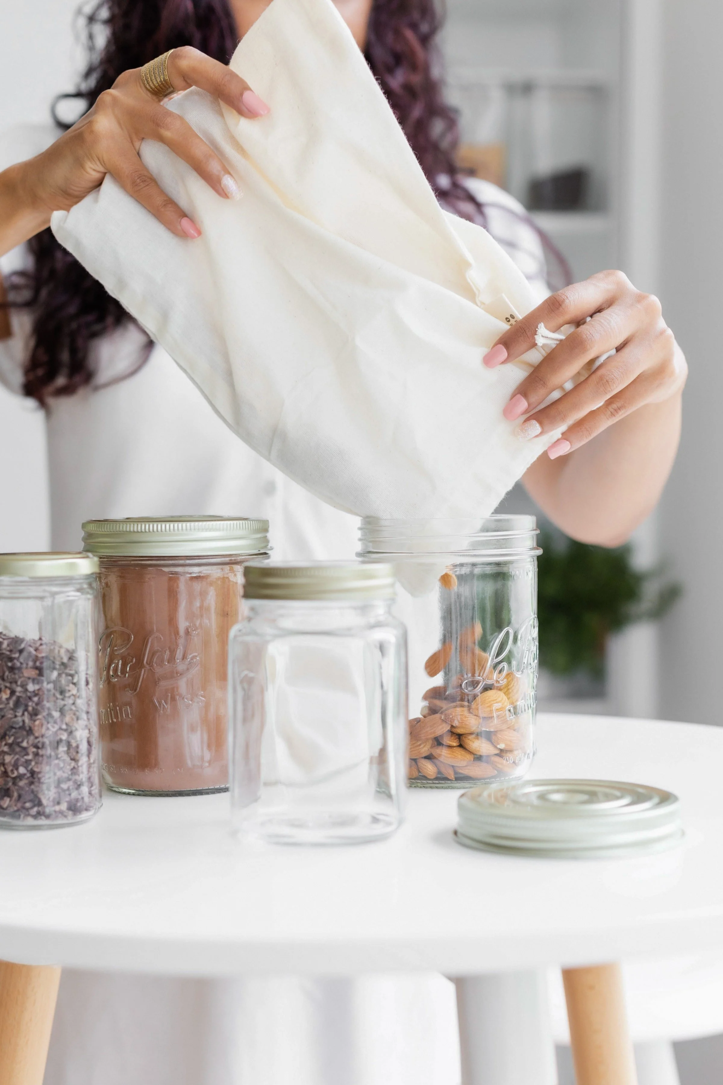 postpartum mom restocking ingredient jars