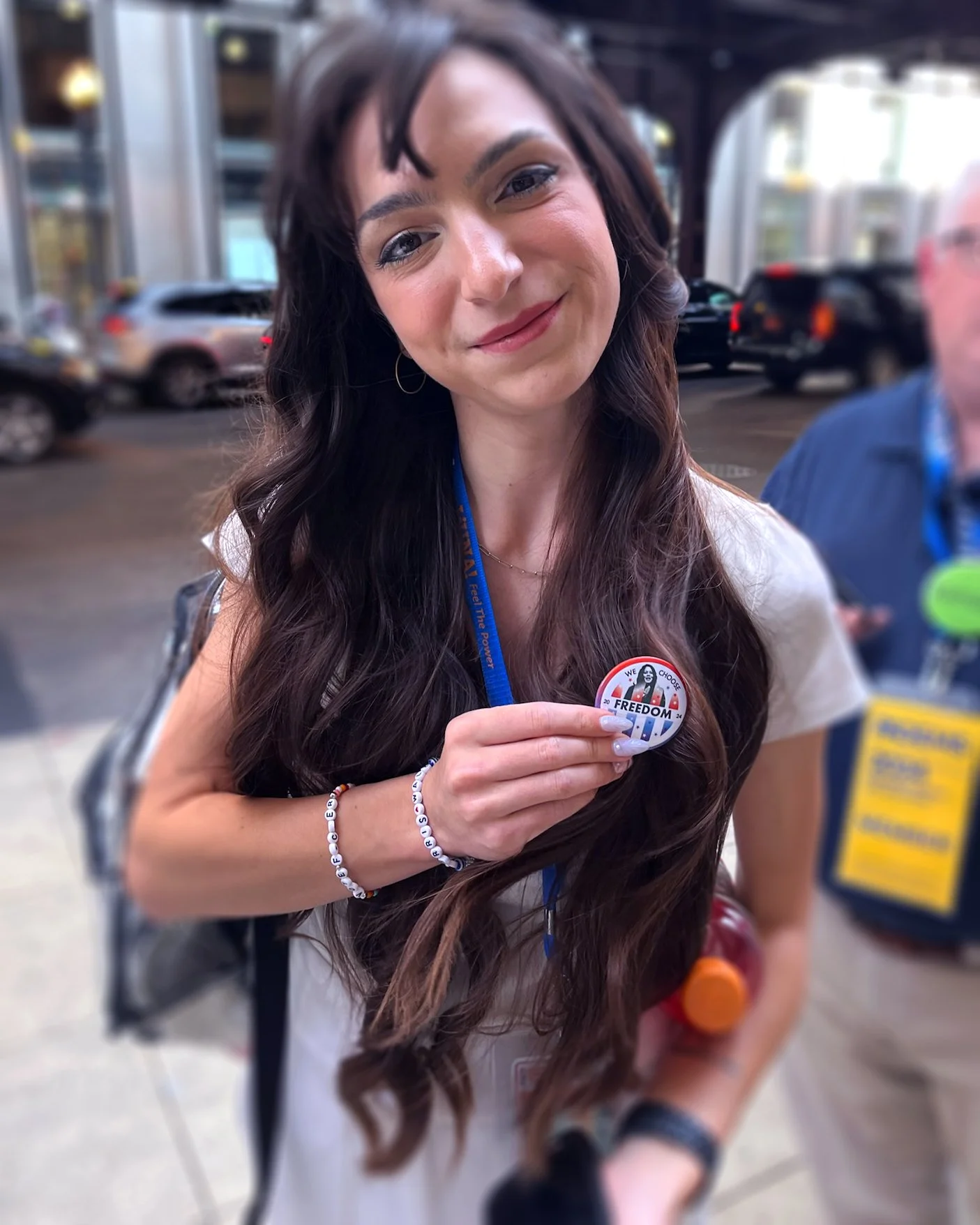 Friendly woman in her 20’s with dark born hair shows her support for Pin For Purpose..jpg