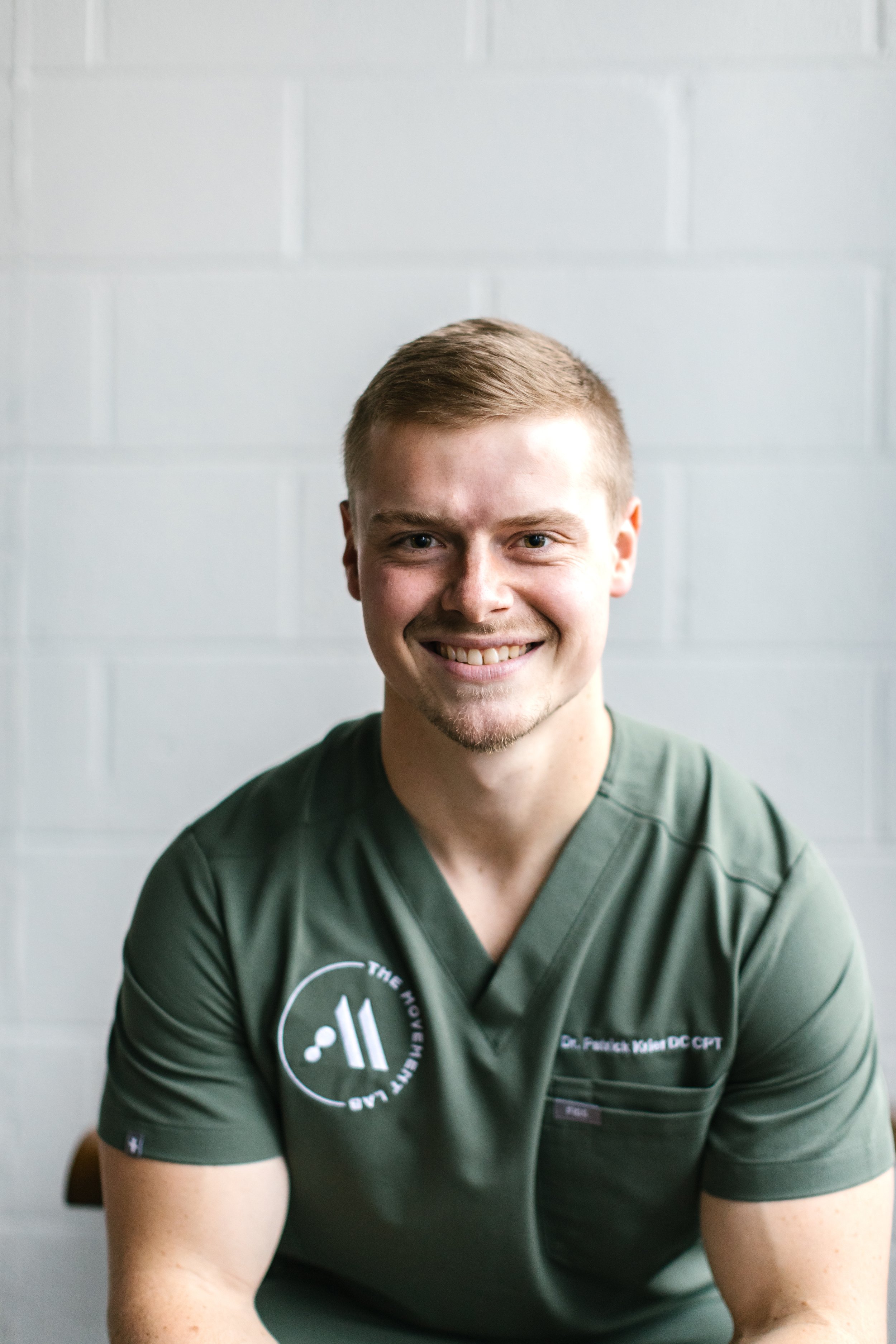 Dr. Patrick Krier of The Movement Lab in Braselton, GA, providing personalized chiropractic and performance-based care