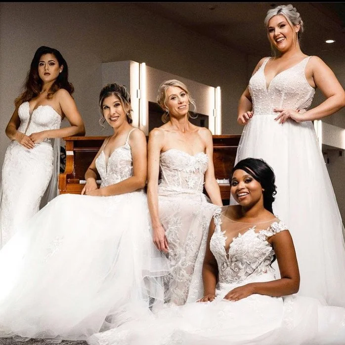 Five brides modeling a variety of wedding gown styles from Sofia Bella Bridal’s curated collection.