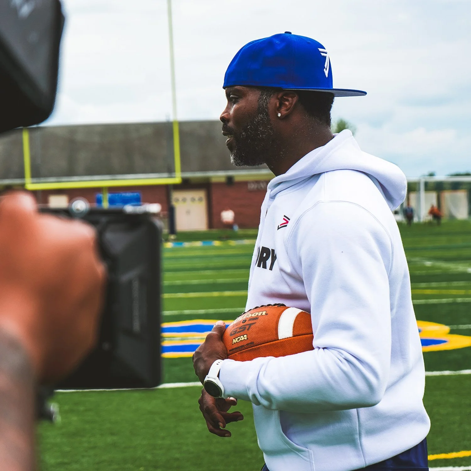 Michael Vick hosts high school camp in partnership with Triumph