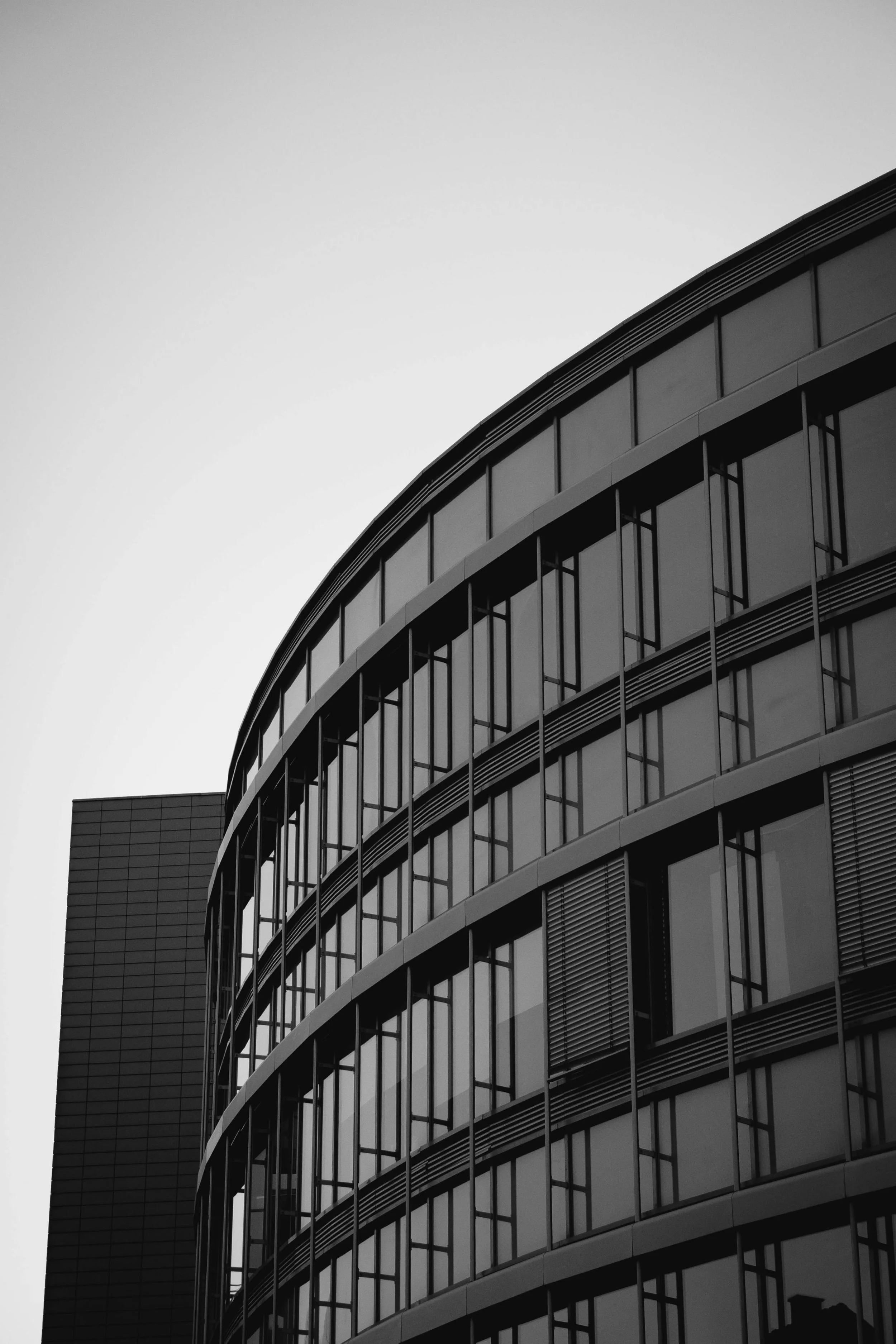 black and white detail image of a round building.jpg