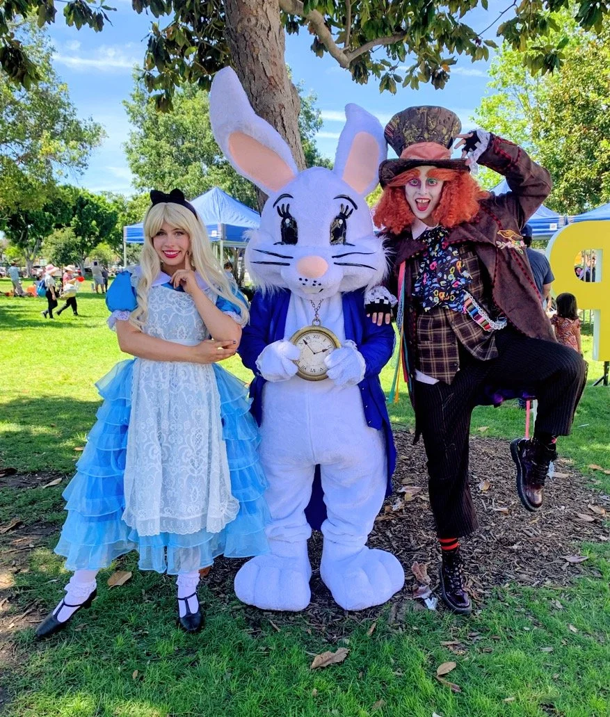 Alice, White Rabbit and Mad Hatter at a Spring Party in Los Angeles