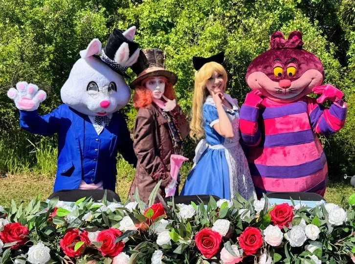 Mad Hatter, Alice, White Rabbit and Cheshire Cat at a breathtaking Alice in Wonderland event in Tampa Bay